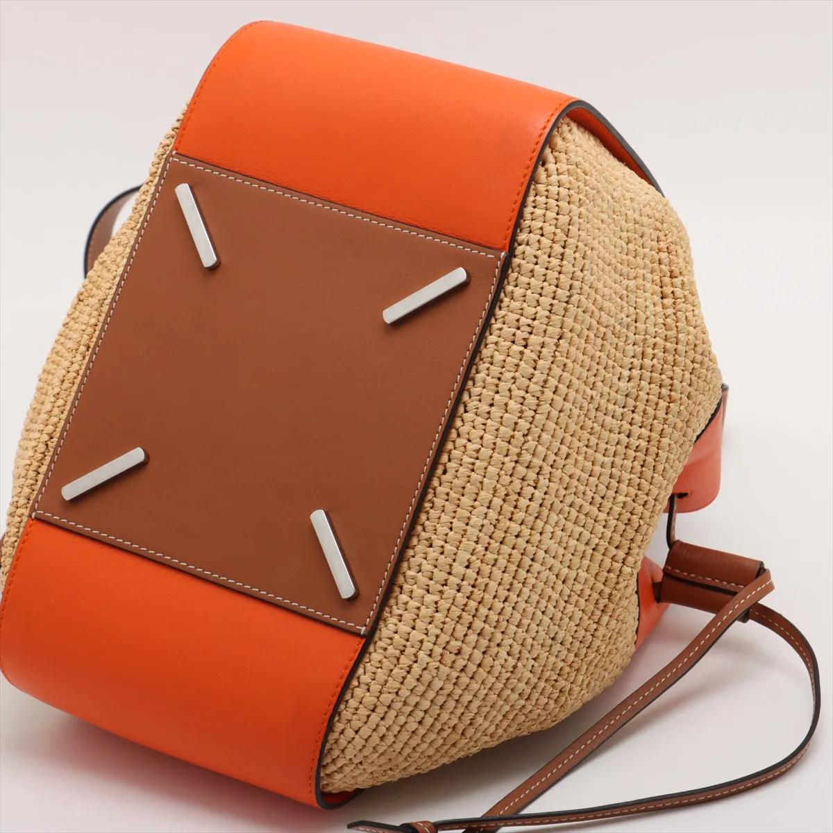 Donna *Loewe Hammock Drawstring Medium Borsa a tracolla in pelle e paglia Marrone x Arancione in vendita