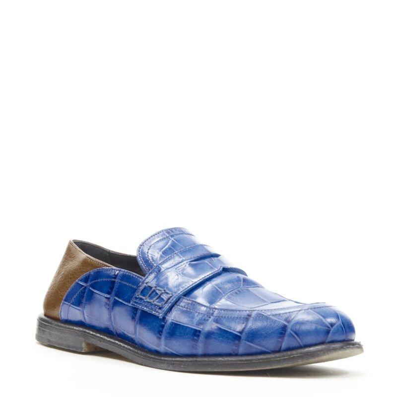 LOEWE JW ANDERSON cobalt blue brown leather step back loafer EU36
Reference: ANWU/A00343
Brand: Loewe
Designer: JW Anderson
Material: Leather
Color: Blue, Brown
Pattern: Solid
Extra Details: Stamped leather. Soft leather convertible step back