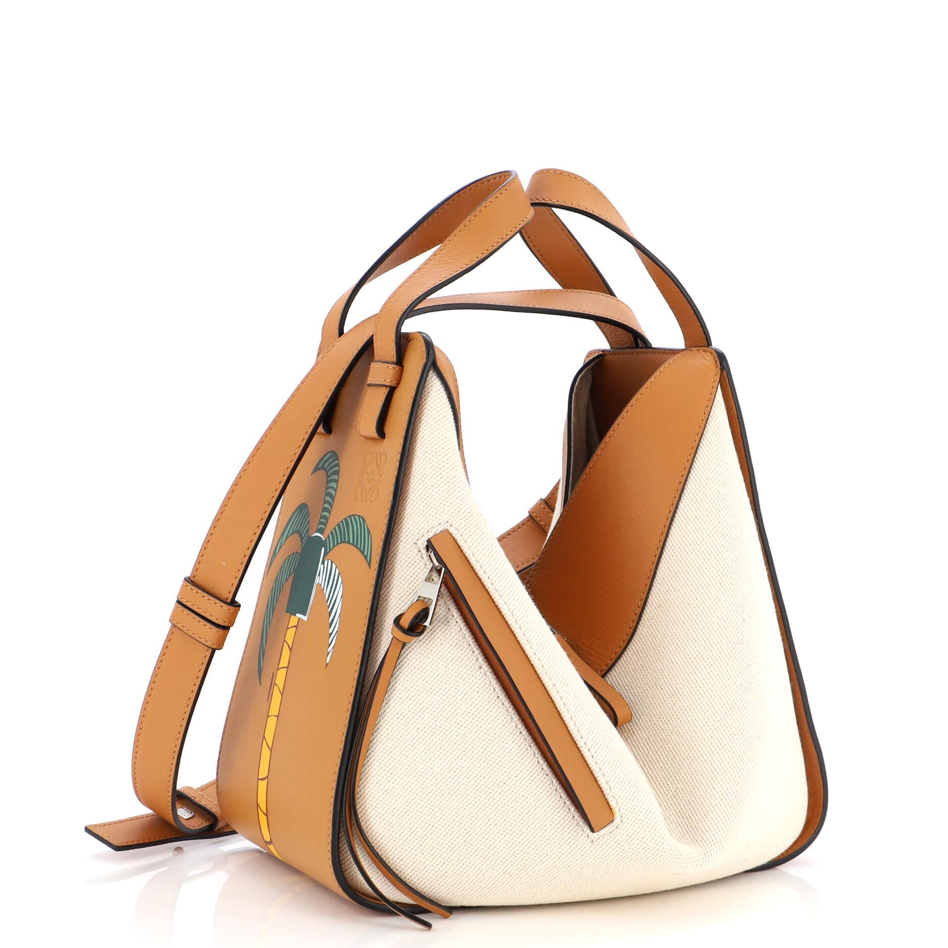 Condition: Excellent. Small mark on leather trims, scratches on hardware.
Accessories: Dust Bag
Measurements: Handle Drop 4