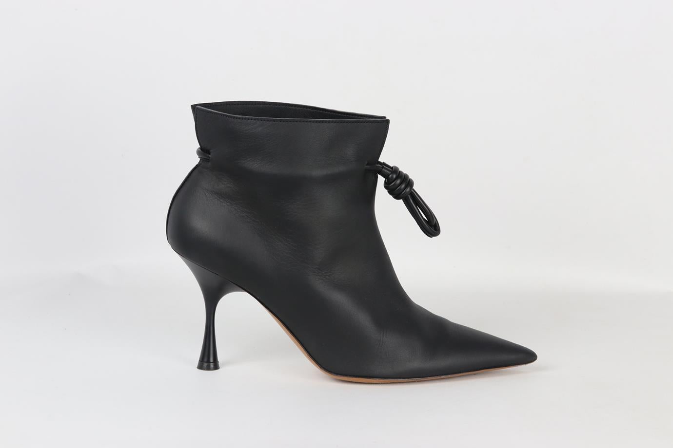 Loewe leather ankle boots. Black. Pull on. Does not come with dustbag or box. Size: EU 39 (UK 6, US 9). Insole: 9.8 in. Heel Height: 2.5 in. Very good condition - Some wear to soles and toe. Light creasing to upper material; see pictures.
