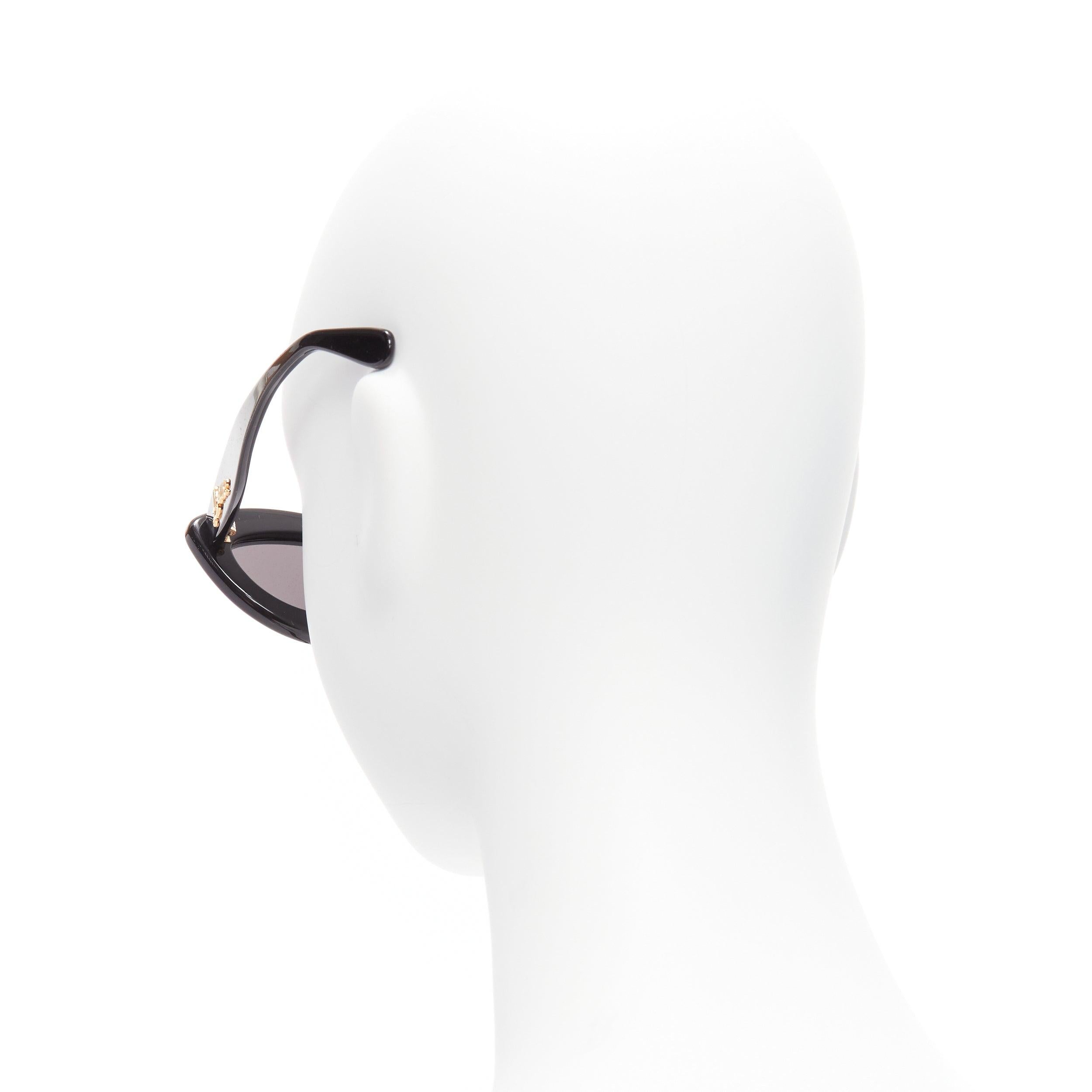 LOEWE LW400961 black acetate gold cursive logo thick frame cat eye sunglasses 1