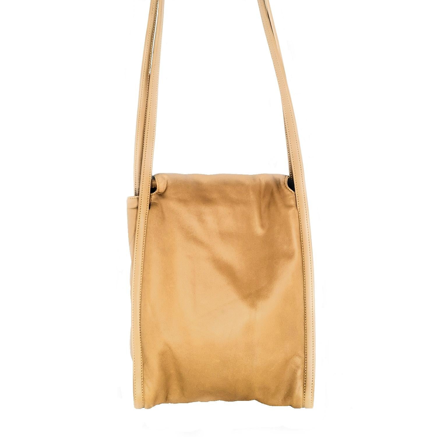 Caramel Nappa leather Loewe shoulder bag made of soft grained leather; gold-tone hardware; jacquard logo print textile interior lining housing a single zipped pocket. Fold-over Flap with magnetic closure. Made in Spain. Comes with Loewe dust