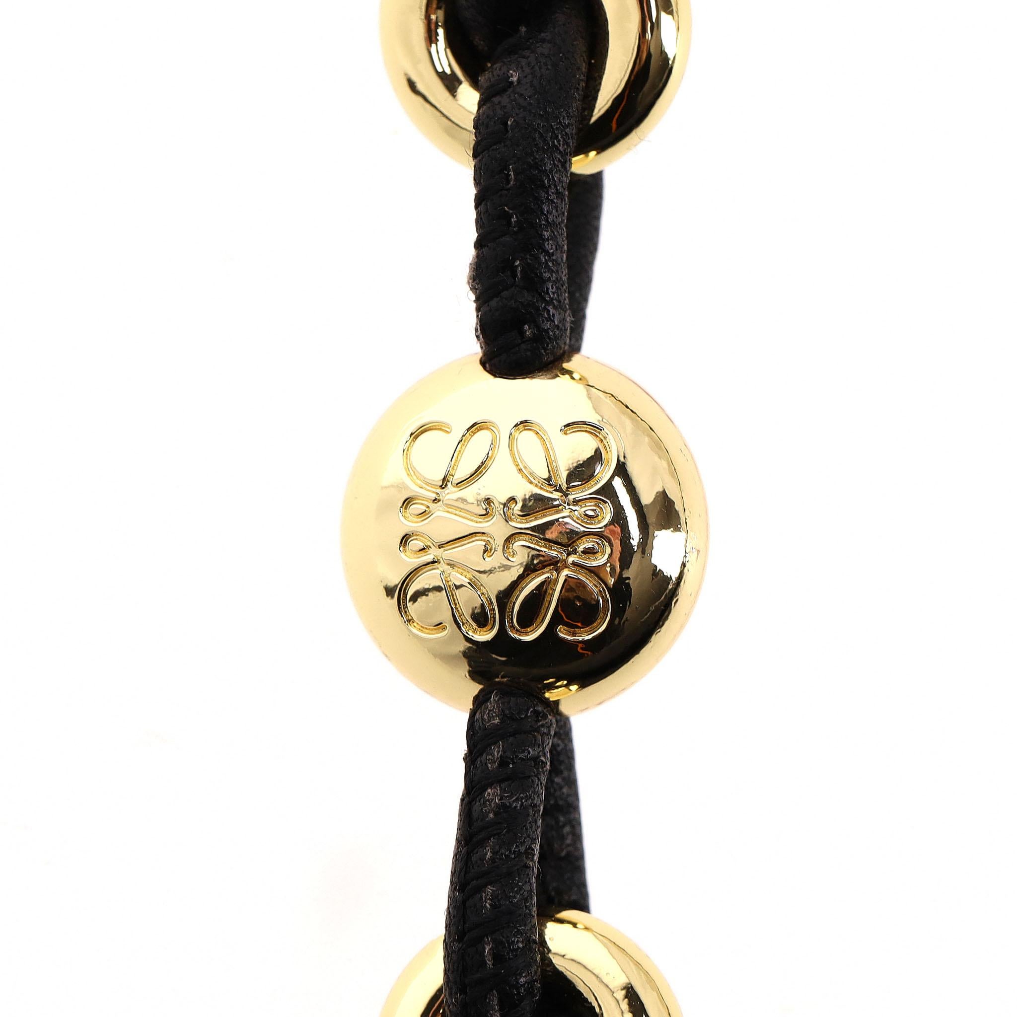 Loewe Borsa media a ciambella in pelle nappa con nodo flamenco in vendita 3