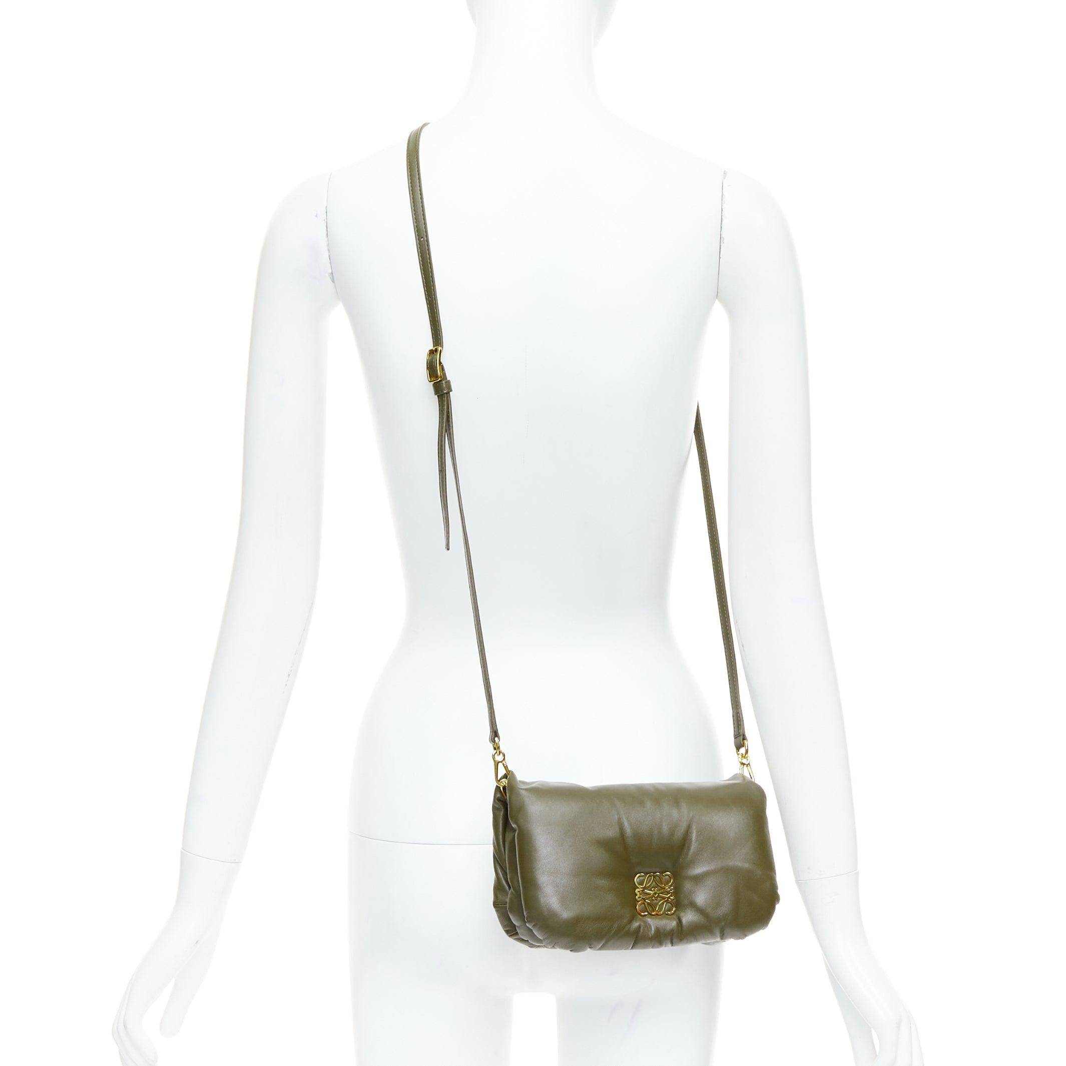 LOEWE Mini Puffer Goya khaki soft nappa padded pillow crossbody bag
Reference: LNKO/A02434
Brand: Loewe
Model: Mini Puffer Goya
Material: Leather
Color: Khaki, Gold
Pattern: Solid
Closure: Magnet
Lining: Khaki Leather
Extra Details: Colour : Dark