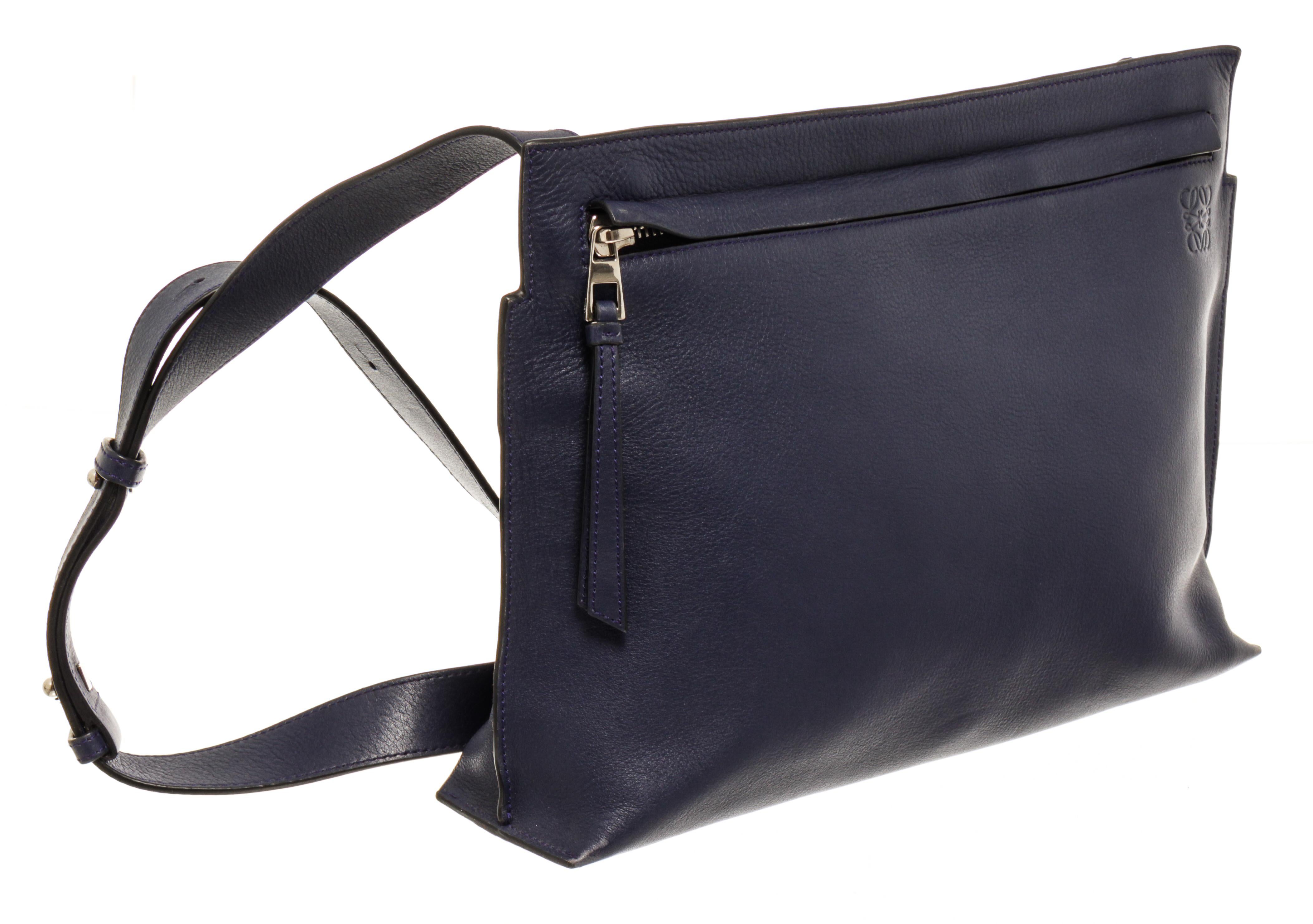 Loewe Navy Blue Leather T Messenger Bag with silver-tone hardware, Loewe embossed logo at the right front, black canvas lining, adjustable shoulder strap, and zipper closure at the top.

440223MSC.