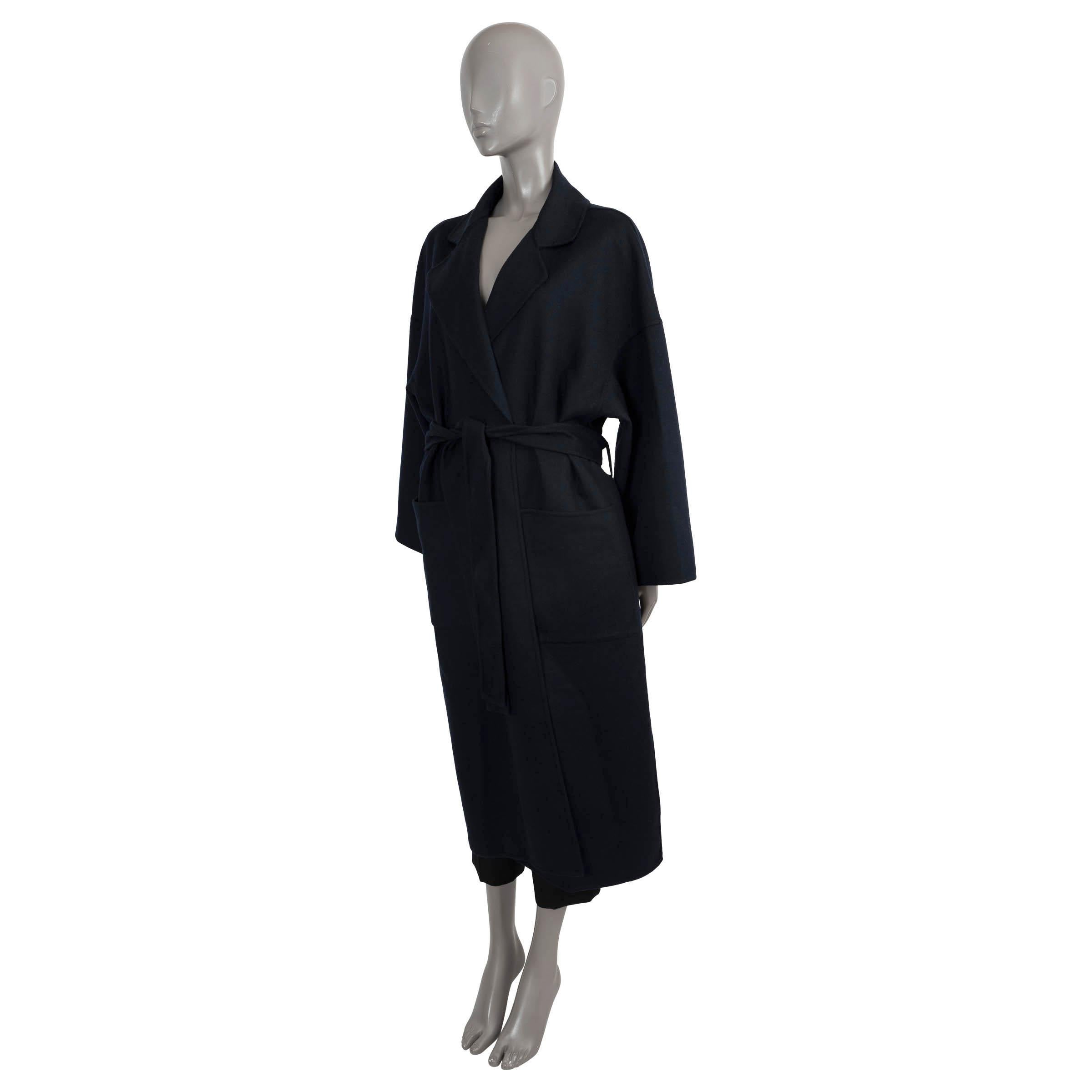 100% authentic Loewe oversized coat in navy blue wool (80%) and cashmere (20%). Features dropped shoulders, side slits, notch lapels and two patch pockets. Closes with a self-tie belt. Has been worn and is in excellent