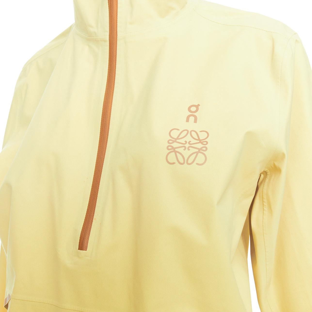 LOEWE ON yellow gradient brown trimming waterproof anorak L
Reference: KNLM/A00366
Brand: Loewe
Designer: JW Anderson
Collection: On
Material: Polyester
Color: Yellow
Closure: Zip
Extra Details: Exterior: 100% polyester. Three-layer membrane