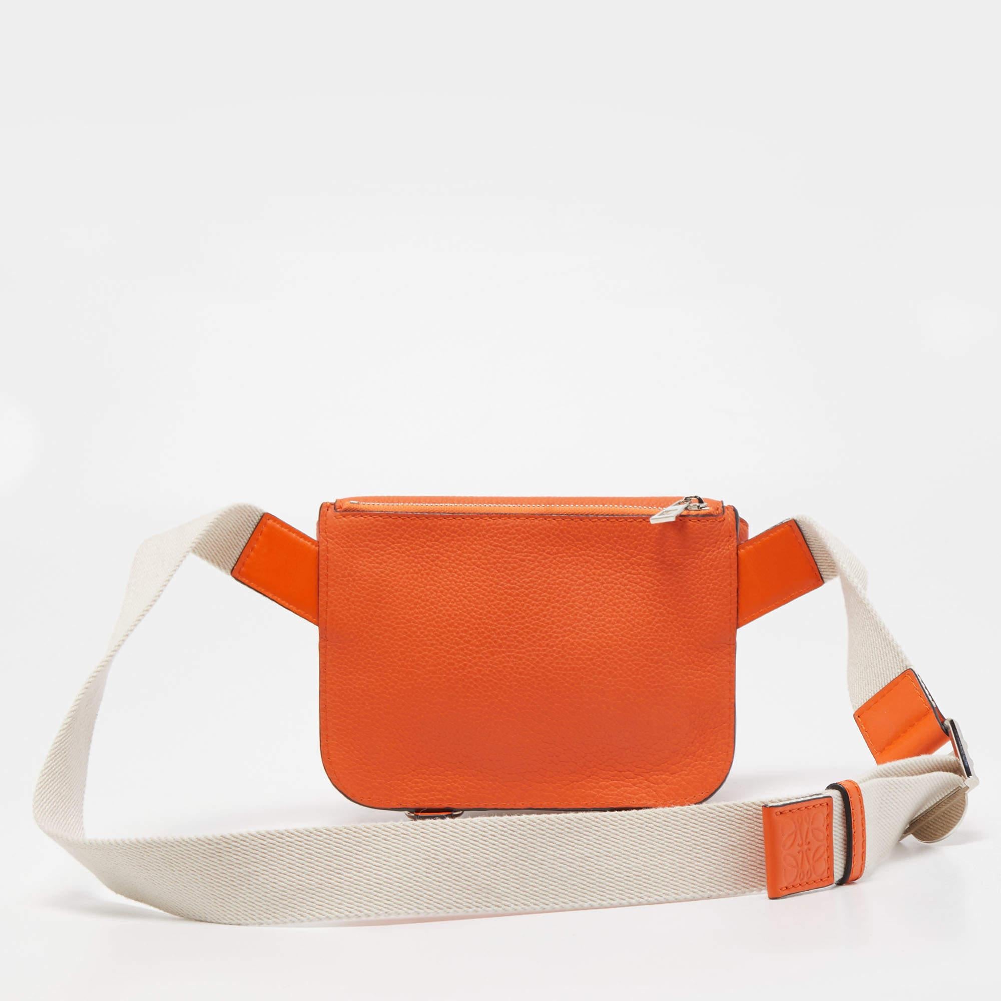 Belt bags are edgy, stylish and will never disappoint you when it comes to completing an outfit! This Loewe one is crafted wonderfully with a chic exterior, a compact, well-lined interor, and an adjustable belt that sits perfectly on your waist. Get