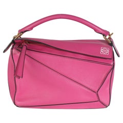 Loewe - Petit sac à main en cuir de veau rose avec bordure en forme de puzzle