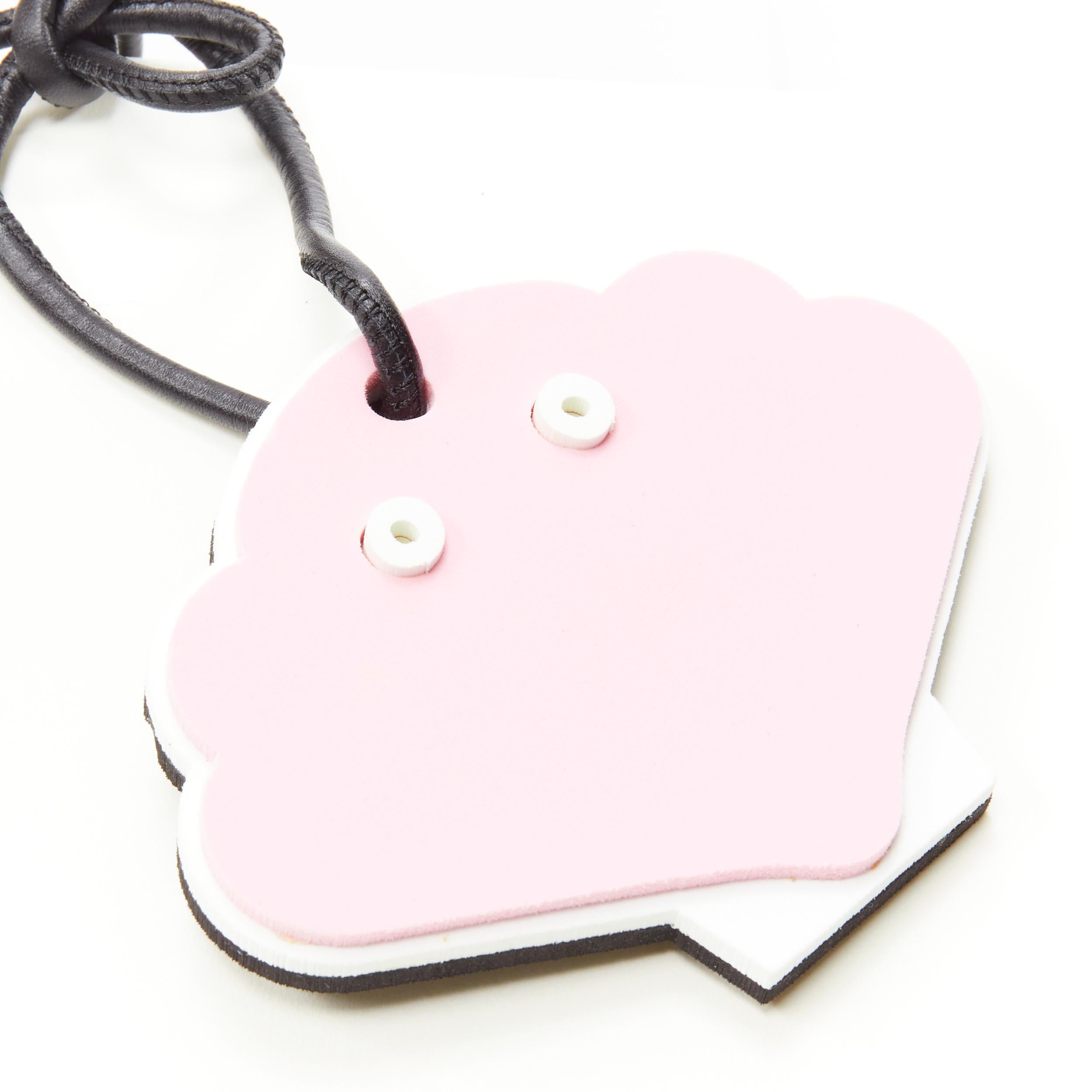 LOEWE pink clam foam black leather cord bag charm 
Reference: ANWU/A00105 
Brand: Loewe 
Designer: JW Anderson 
Material: Foam 
Color: Pink 
Pattern: Solid 
Closure: Tie 
Extra Detail: Styrofoam charm with leather cord self tie strap. Silver-tone