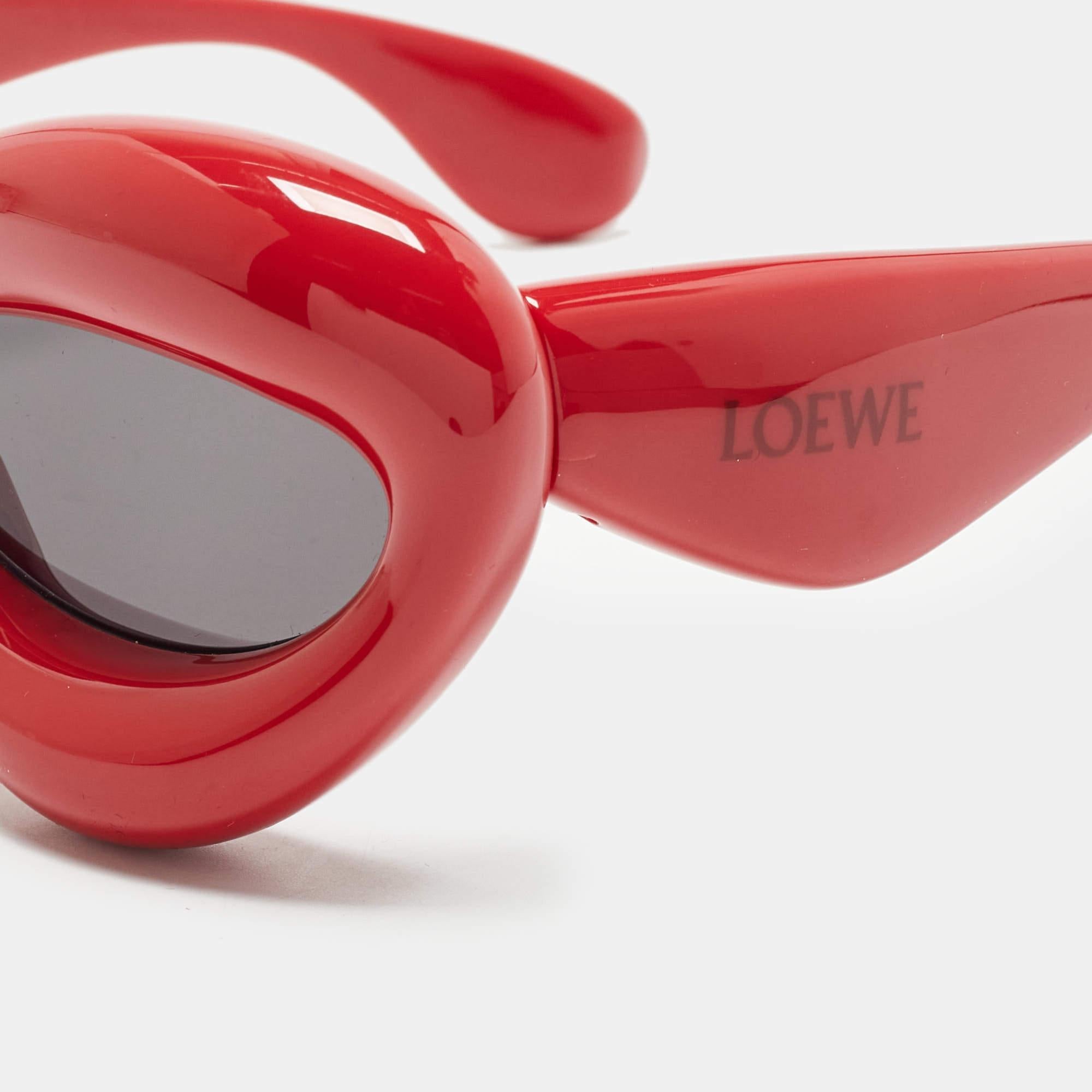 Let your accessories also help you make the right style statement. Choose creations like these sunglasses from Loewe to do just that for you. The design of the inflated red frame with high quality lenses has a standout appeal.