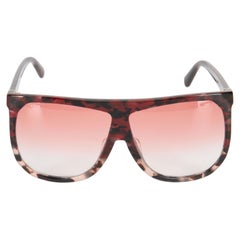 Loewe Lunettes de soleil dégradées en écaille rouge