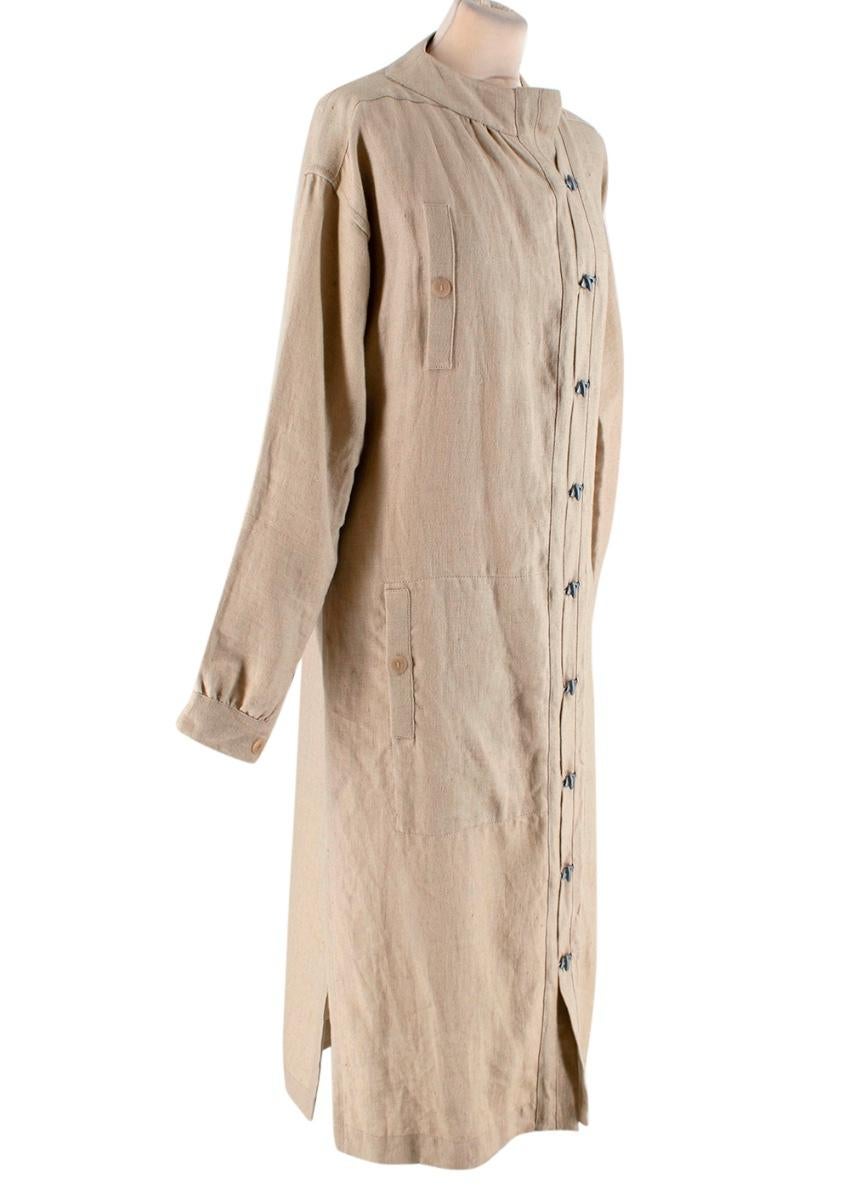 Loewe Sand Linen Long-Sleeve Maxi Dress

- Chest pocket 
- Asymmetric Front Closure 
- Can be worn open, as top or jacket or fully closed as a dress
- Long Sleeves
- Clasp button front closure 
- Silver tone hardware 
- buttoned cuffs
- straight