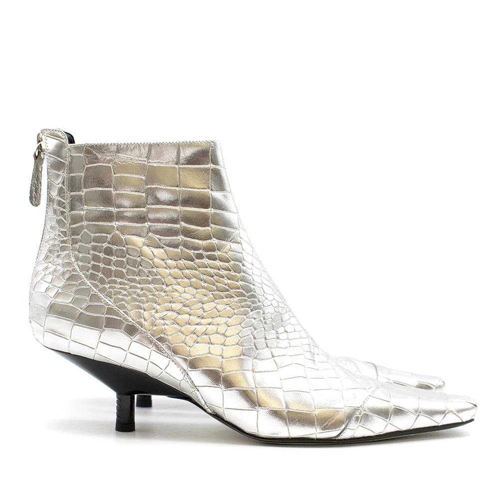 Loewe metallic ankle boots in croc embossed leather featuring a square-toe and a zip-closure at counters. 

- Made in Italy

Please note, these items are pre-owned and may show signs of being stored even when unworn and unused. This is reflected