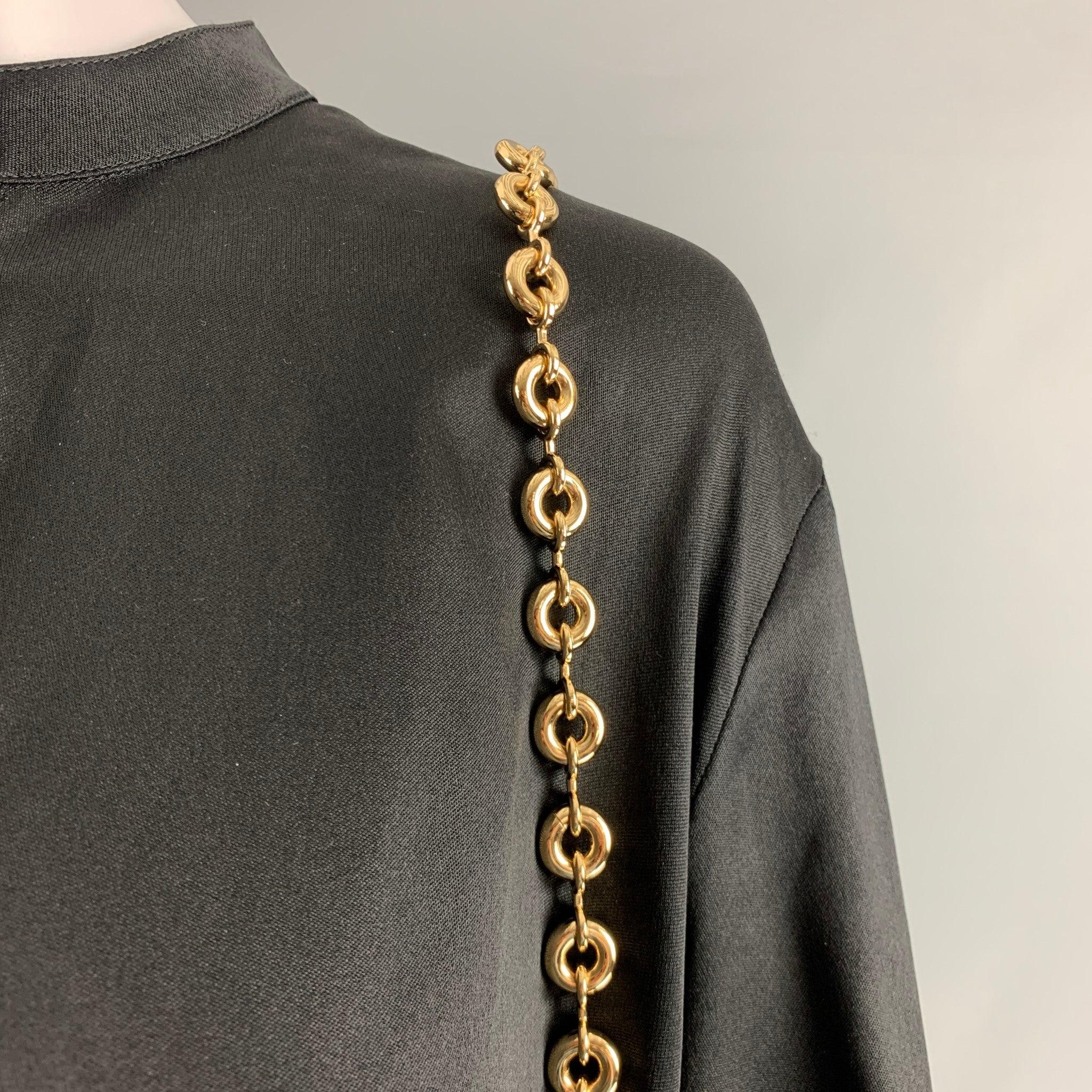 LOEWE oversized shirt dress comes in a black silk featuring a gold tone chain accent, long sleeves, collarless and a buttoned closure. New with Tags. 

Marked:   32 

Measurements: 
 
Shoulder: 17 inches Bust: 44 inches Hip: 49 inches Sleeve: 23.5
