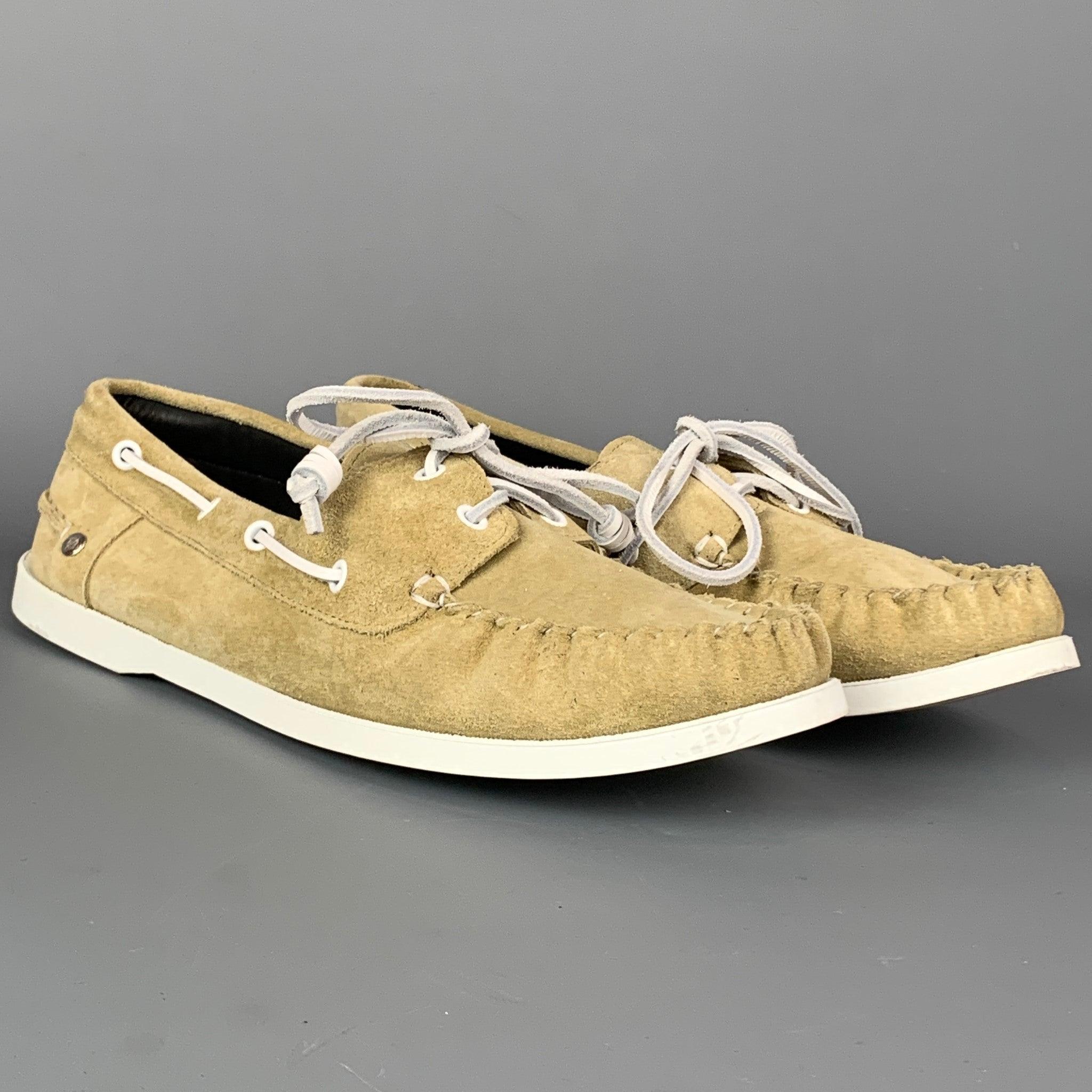 LOEWE loafers comes in a natural suede featuring a boat style, twisted trim, rubber sole, and a leather lace up closure. Made in Portugal.Very Good
Pre-Owned Condition. 

Marked:   EU 44Outsole:12 inches  x 4 inches 
  
  
 
Reference: