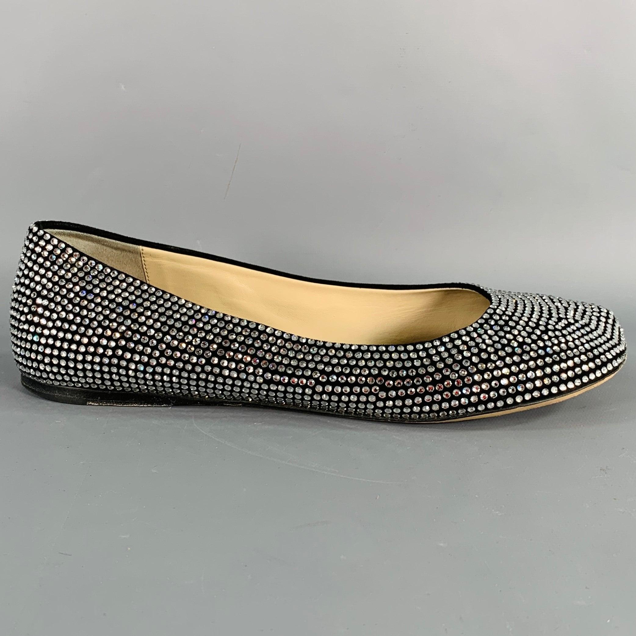 LOEWE flats
in a black suede featuring a silver tone rhinestone studded design, ballet style, and slip on closure. Comes with box. Made in Italy.Very Good Pre-Owned Condition. Signs of wear on soles. 

Marked:   952512 41Outsole: 10.5 inches  x 3.75