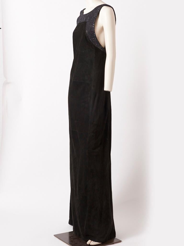 Loewe, slightly fitted, suede, halter neck gown having a low back, and tiny black, beading detail sewn onto black leather ground that decorates the neckline, armholes and back.