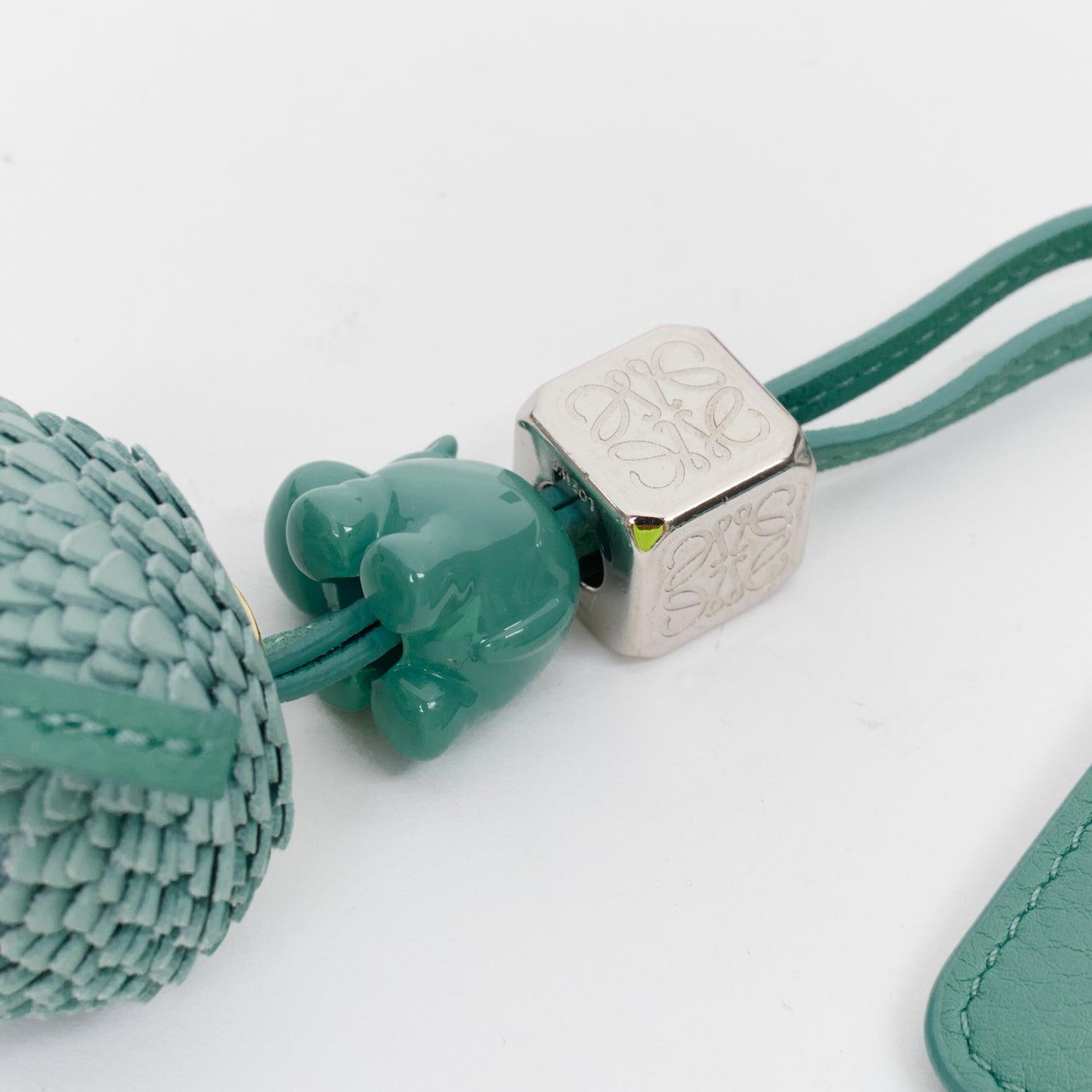 LOEWE teal blue leather hippo anagram pine charm logo zip holder
Reference: KYCG/A00145
Brand: Loewe
Designer: JW Anderson
Material: Leather
Color: Blue, Silver
Pattern: Solid
Closure: Zip
Lining: Blue Leather
Extra Details: Hippo and pine motif