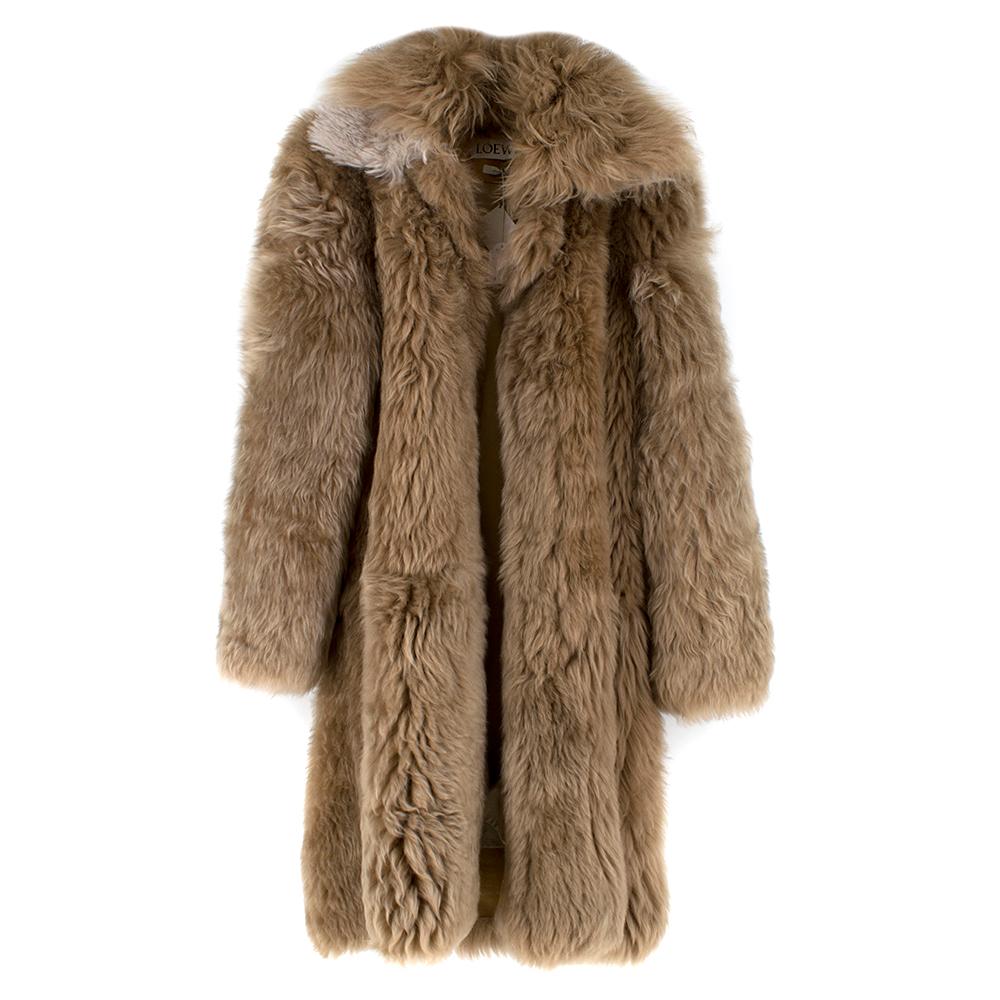 Loewe Toffee Lamb Shearling Double Collar Coat

-Shearling double collar coat
-Calf skin interior rim
-Cotton interior 
-Three interior pocket
-Large brown buttons for closure
-Heavy weight

Please note, these items are pre-owned and may show some