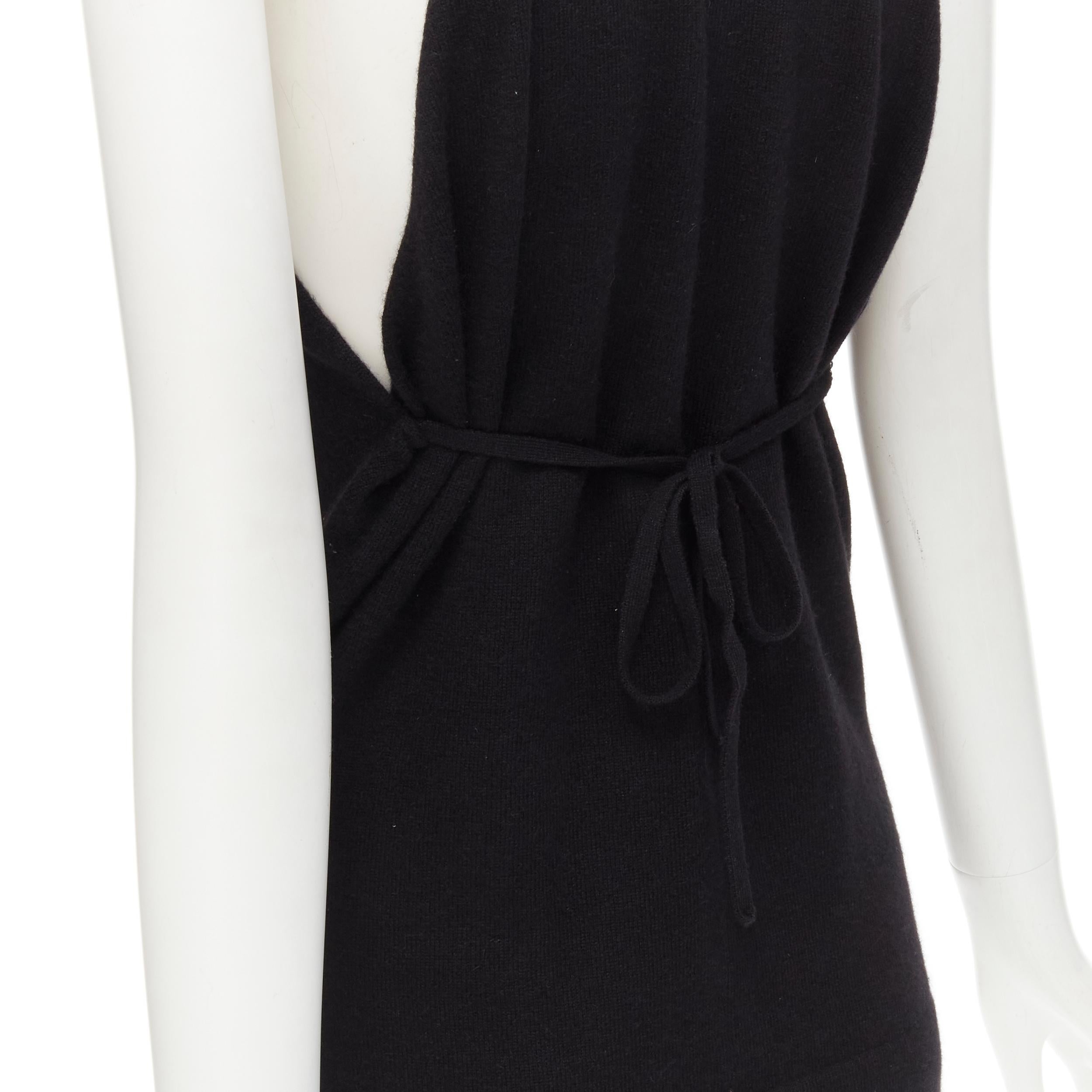 LOEWE Vintage 100% cashmere black knit racer back vest top S 
Reference: AEMA/A00092 
Brand: Loewe 
Material: Cashmere 
Color: Black 
Pattern: Solid 
Extra Detail: There are tie strap details attached at underarm for wearer to tie a bow at back.