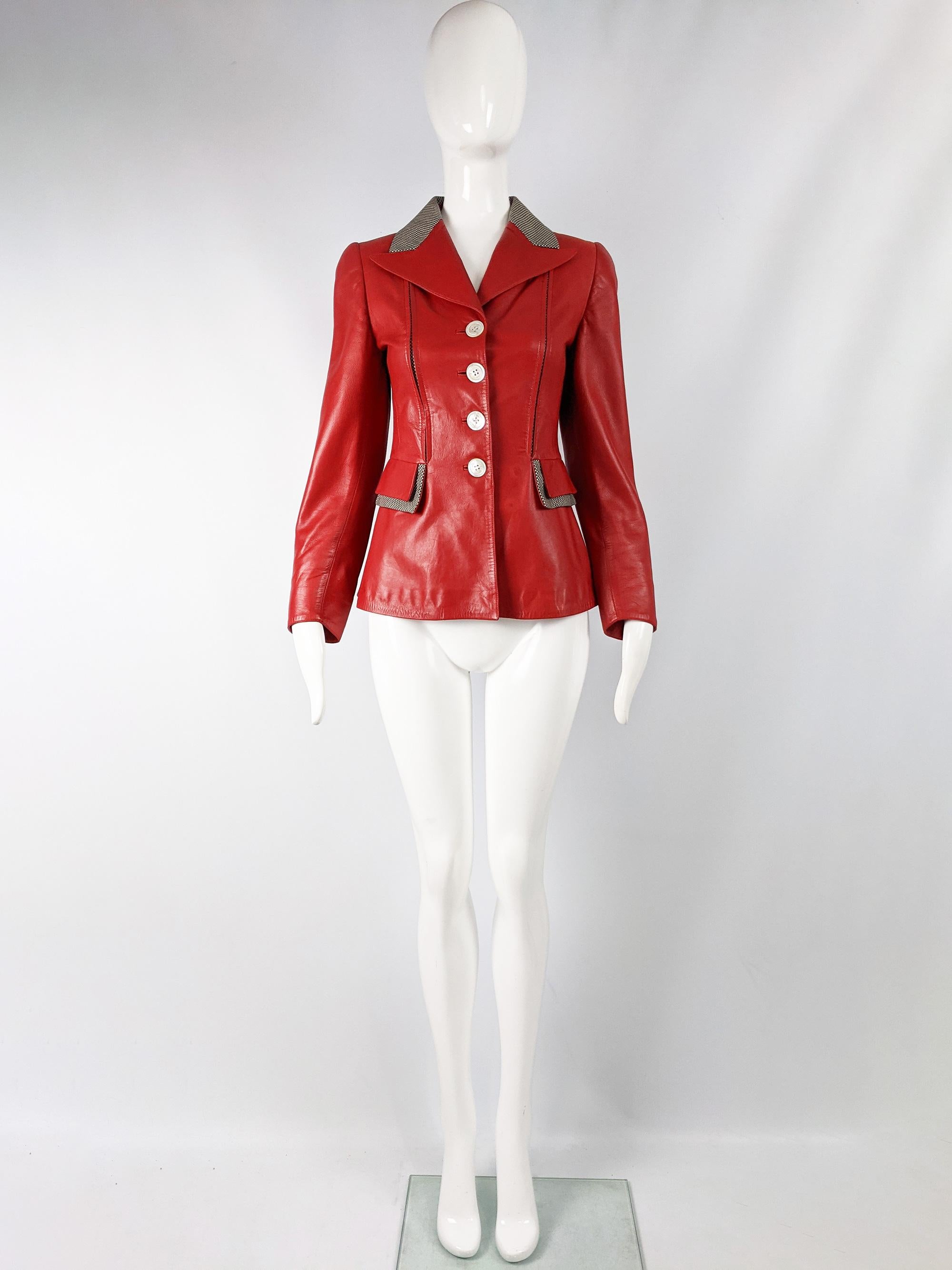 An amazing vintage womens leather jacket from the 80s by luxury Spanish fashion house, Loewe. In a bold red leather with a black and white houndstooth patterned wool. 

Size: Marked vintage 38 but fits more like a modern UK 6-8/ US 2-4/ EU 34-36.