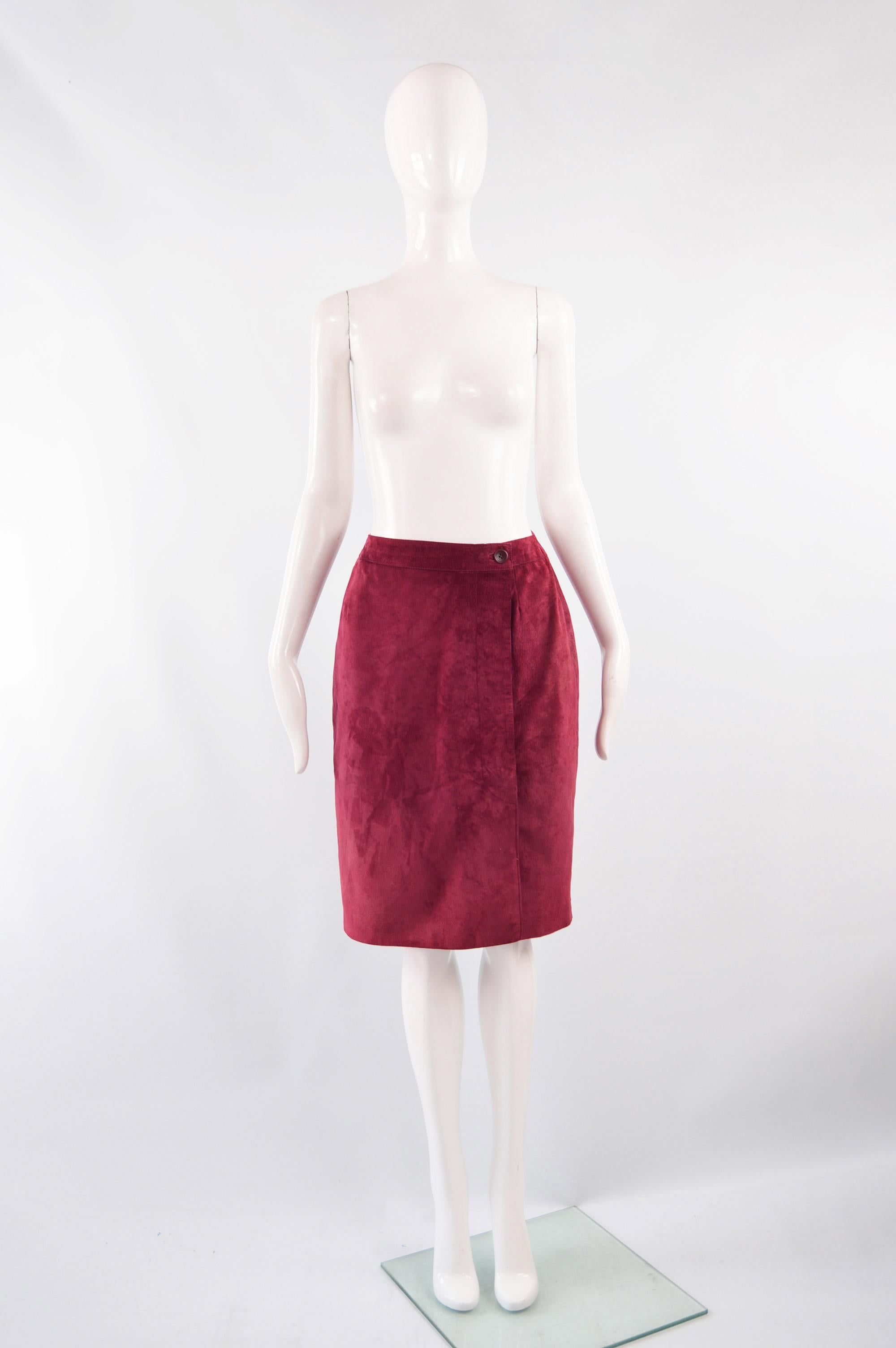 A beautiful vintage women's skirt from the 80s by luxury Spanish fashion house, Loewe. In a red suede with an amazing moiré lining that has the logo woven throughout. 

Size:  Marked vintage 42 but fits more like a modern women's UK 8/ US 4/ EU 36.