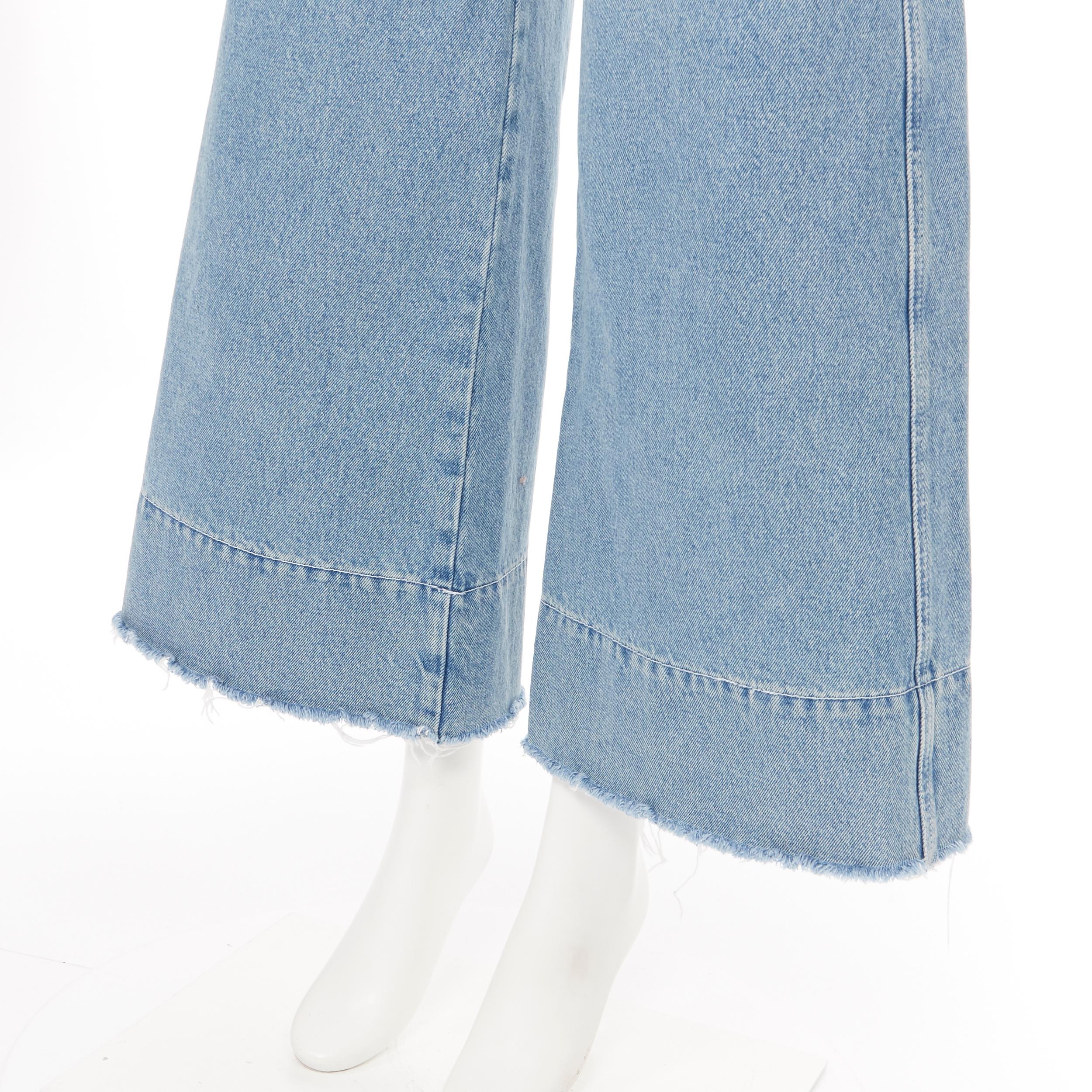 LOEWE washed blue vintage denim frayed raw cut hem wide leg jeans FR34 25