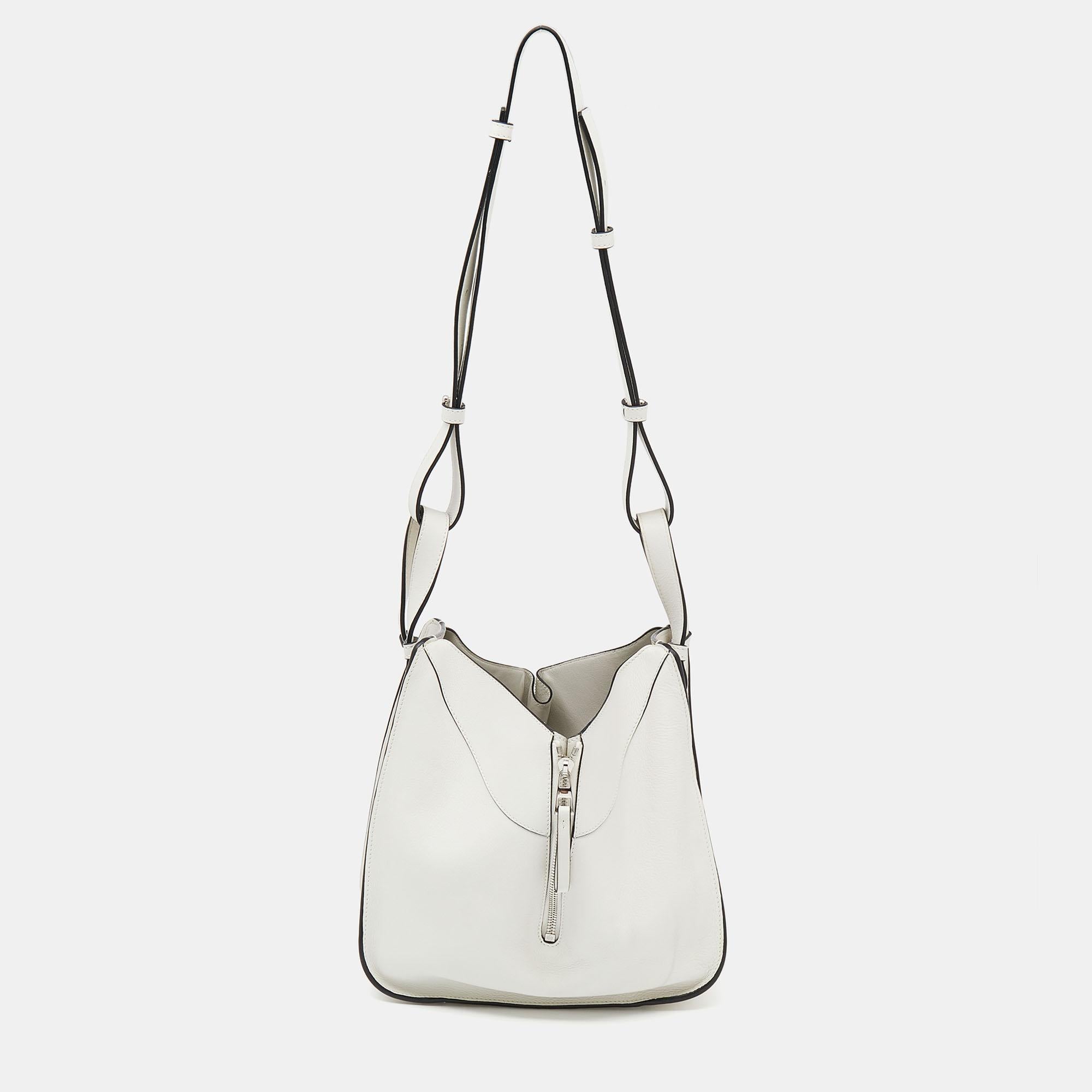 Loewe's high regard for unique designs and quality craftsmanship is exhibited in this small Hammock shoulder bag. Crafted using white leather, the shoulder bag has a highlighting zip detail along the middle, dual short handles with an attached