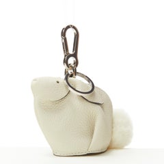 LOEWE white pebble leather shearling fur ball tail coins pouch bag charm