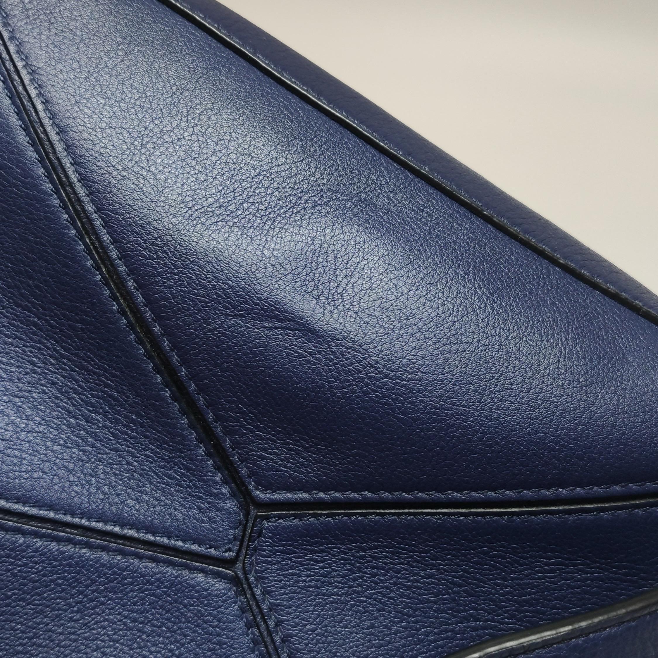 Riñonera Loewe x Howl's Moving Castle Studio Ghibli Calcifer Puzzle Pequeño Azul Marino en venta 6