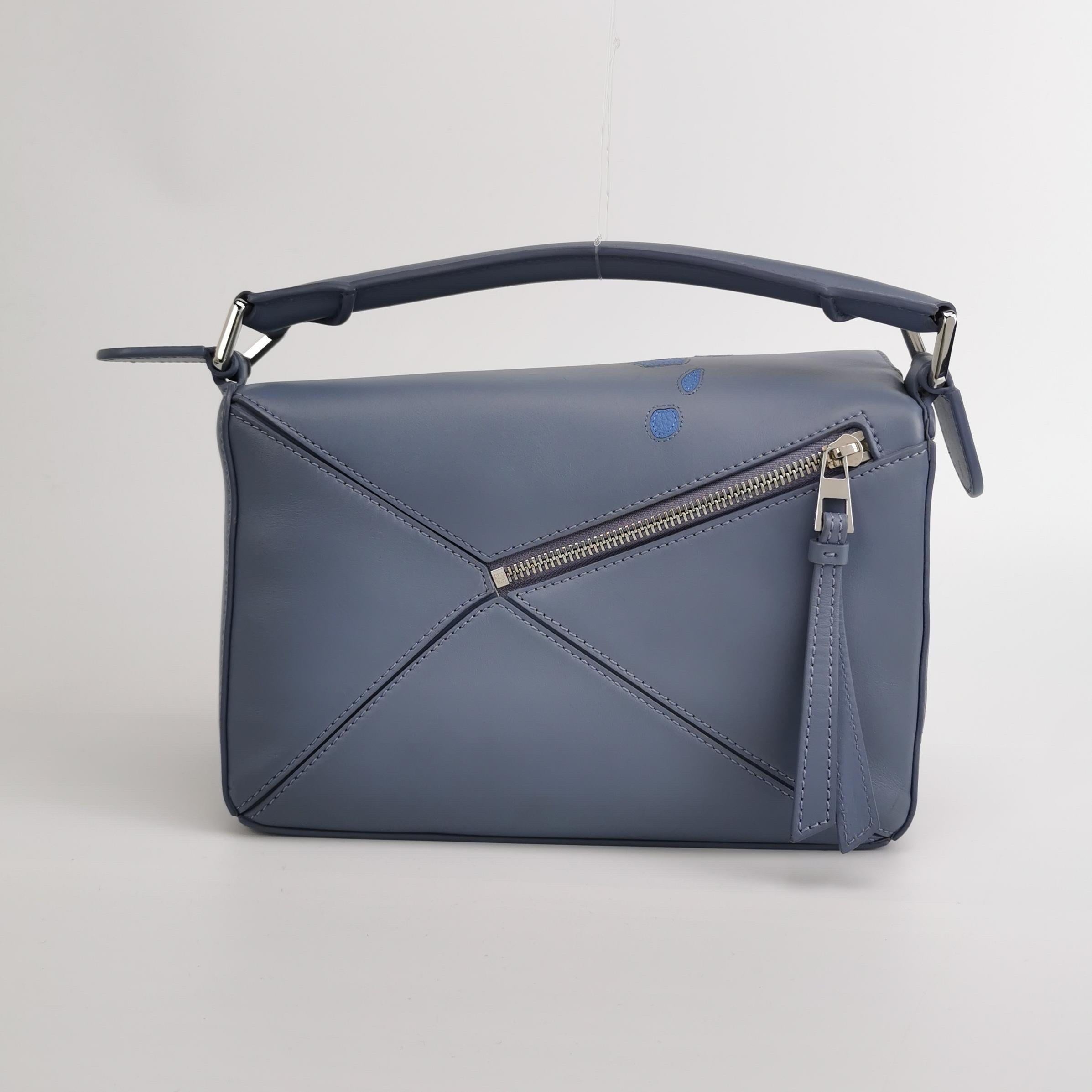 Donna Loewe x Howl's Moving Castle Studio Ghibli Puzzle Calcifer Small MISTI blu in vendita