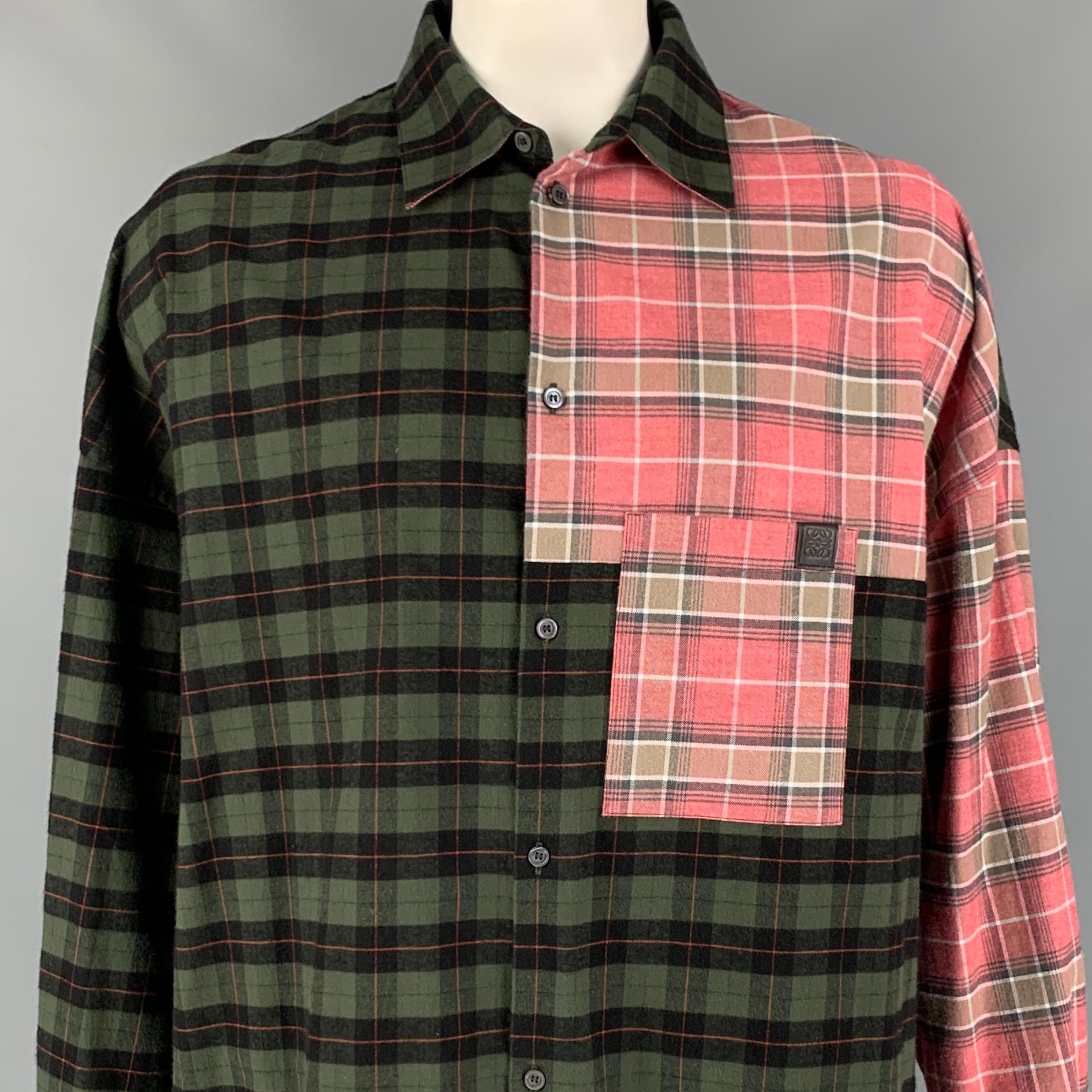 LOEWE x J.W.Anderson long sleeve shirt comes in a green & pink plaid cotton featuring a oversized fit, front pocket, and a buttoned closure. Made in Romania. 

New With Tags. 
Marked: 43
Original Retail Price: $675.00

Measurements:

Shoulder: 31