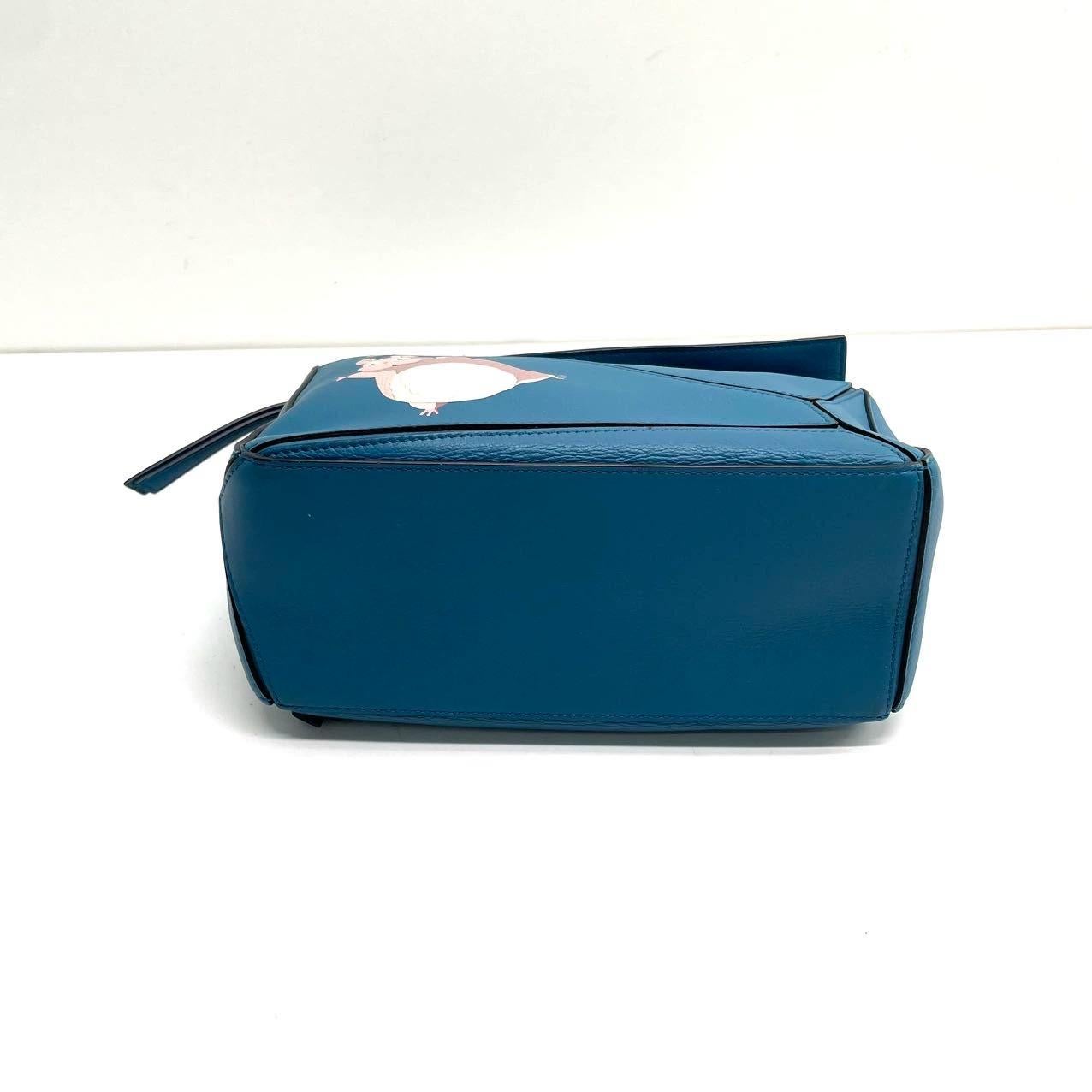 Loewe x Spirited Away Studio Ghibli Collection'S Puzzle Borsa a tracolla piccola blu
Queste sono foto professionali della borsa offerta da Luxbags.

Questo è il frutto della collaborazione tra Loewe e lo Studio Ghibli del Giappone. Questo