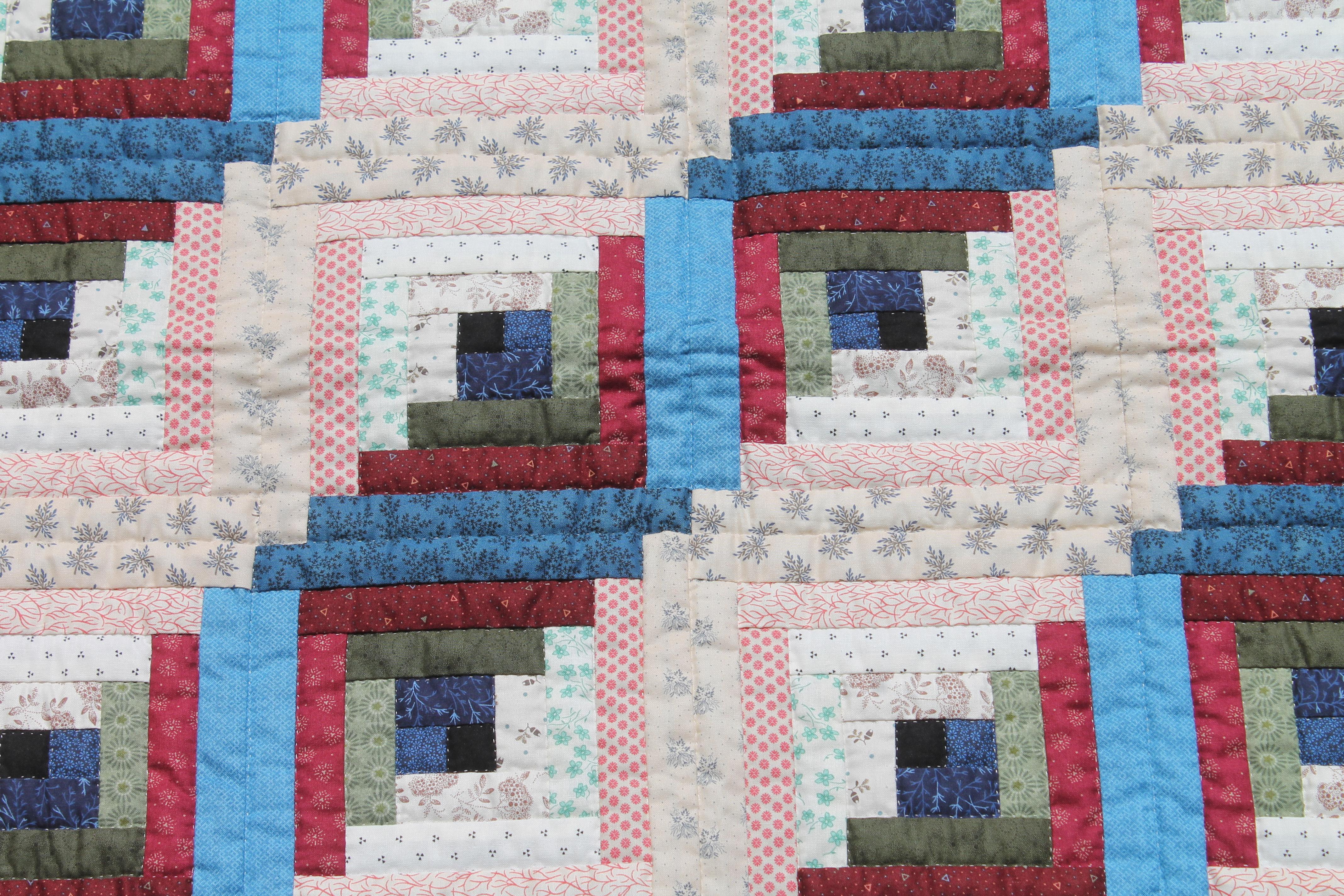 This finely pieced and quilted crib quilt was found in Lancaster County, Pennsylvania and is in pristine condition. The fine calico fabrics are really wonderful. This quilt has never been laundered.