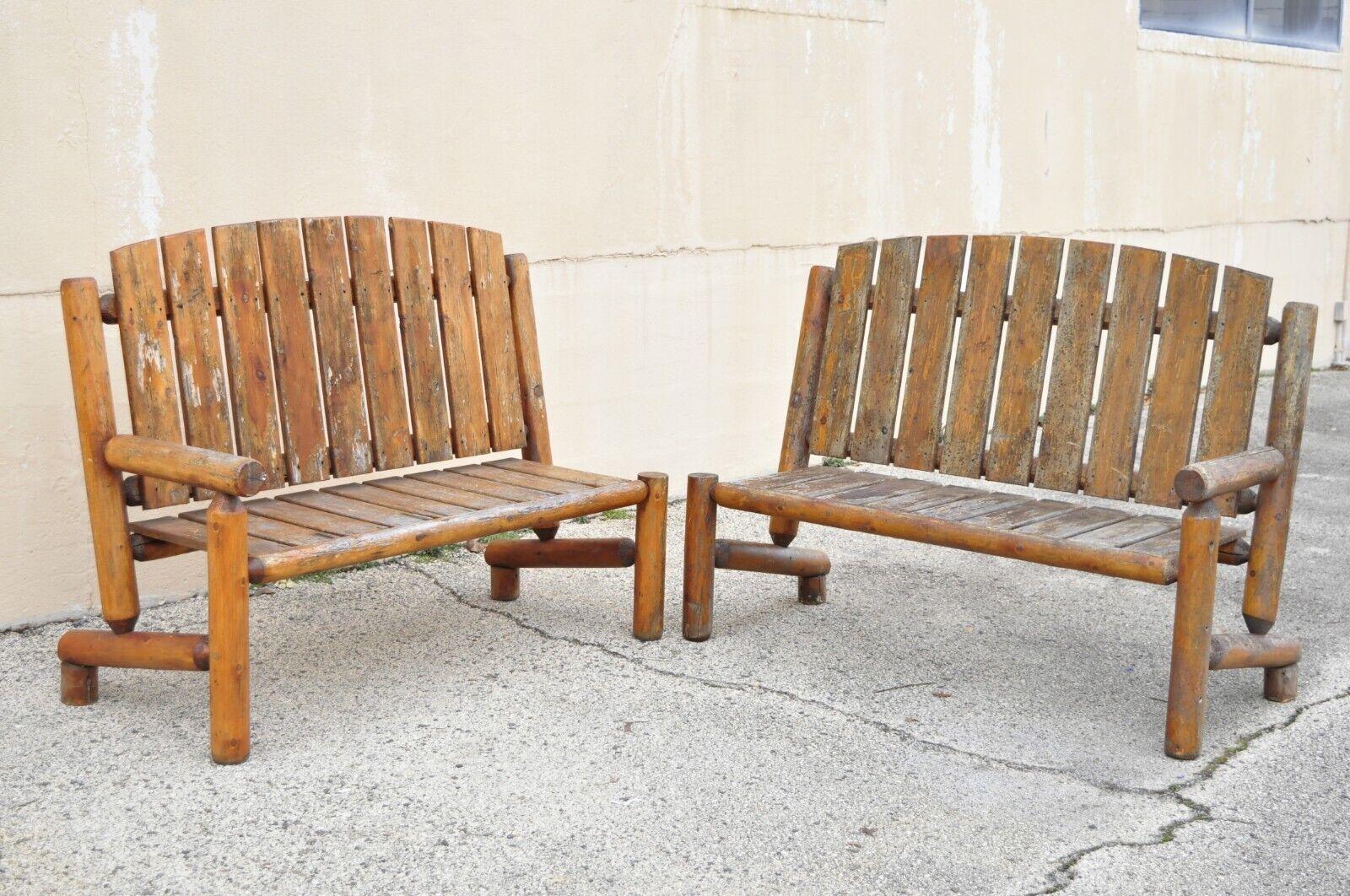 Log cabin Primitive Adirondack wooden log outdoor bench sofa set - 2 pcs. Item features (2) armless sections, can be used as one long sofa or 2 separate pieces with example layouts pictured, solid wood construction, distressed finish, very nice set,