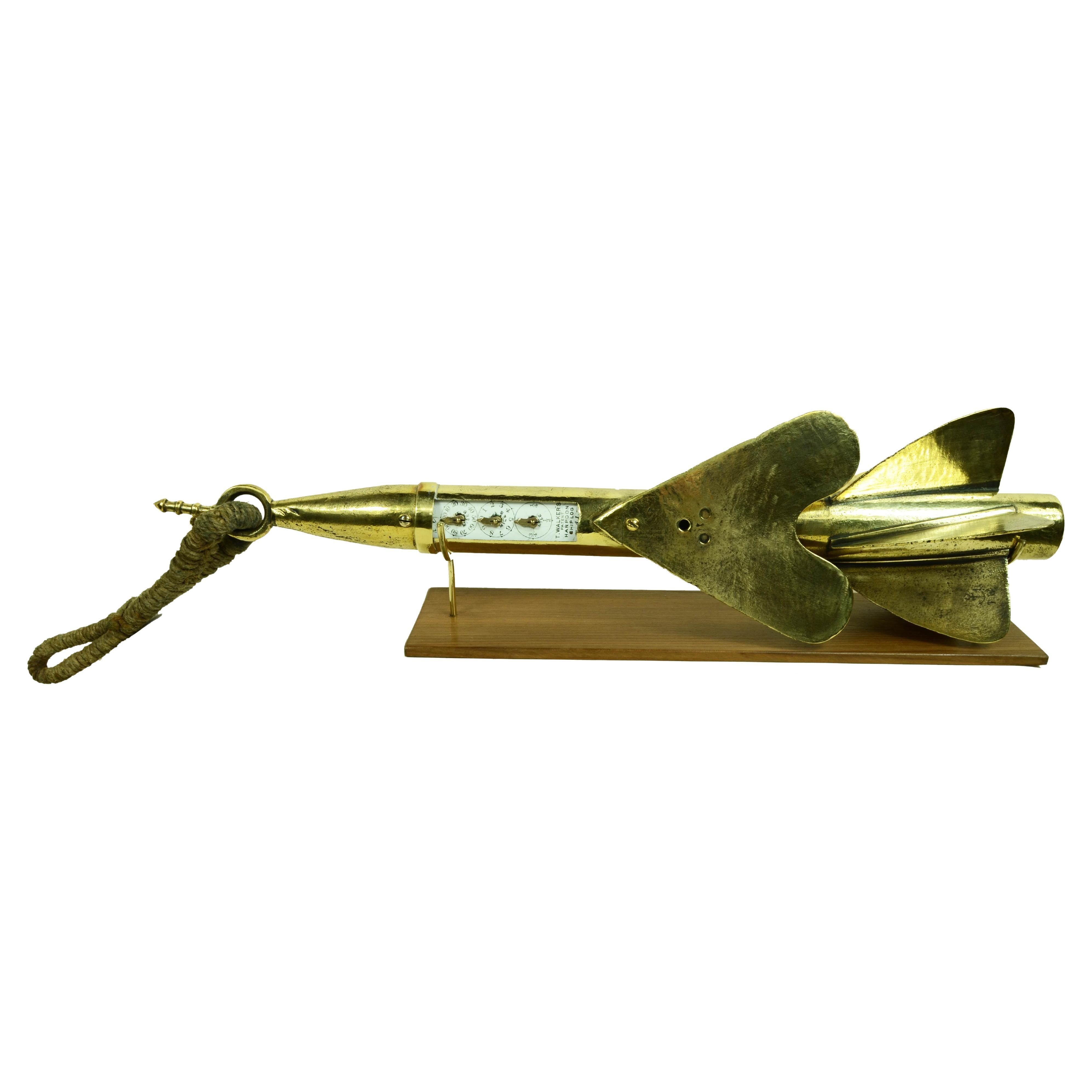 Brass nautical log or solcometer in the shape of a  speargun, signed T. Walker's 1870