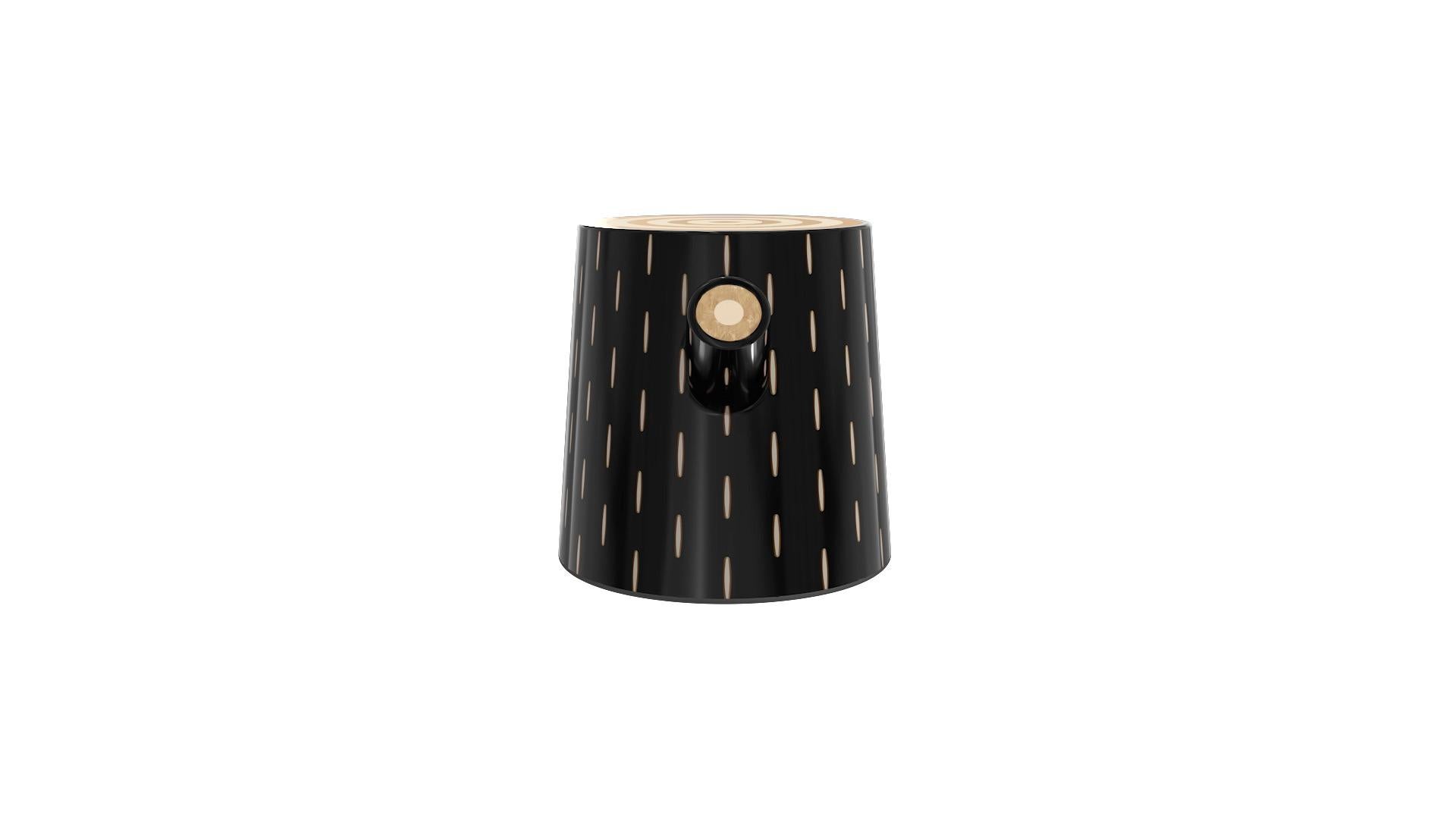 Log stool side table with brass inlay by Marcantonio has a playful form with brass and resin inlay. It can be used as a seat or a side table.

For his debut creations, Marcantonio introduced “Vegetal Animal”, a concept that evokes strong emotions