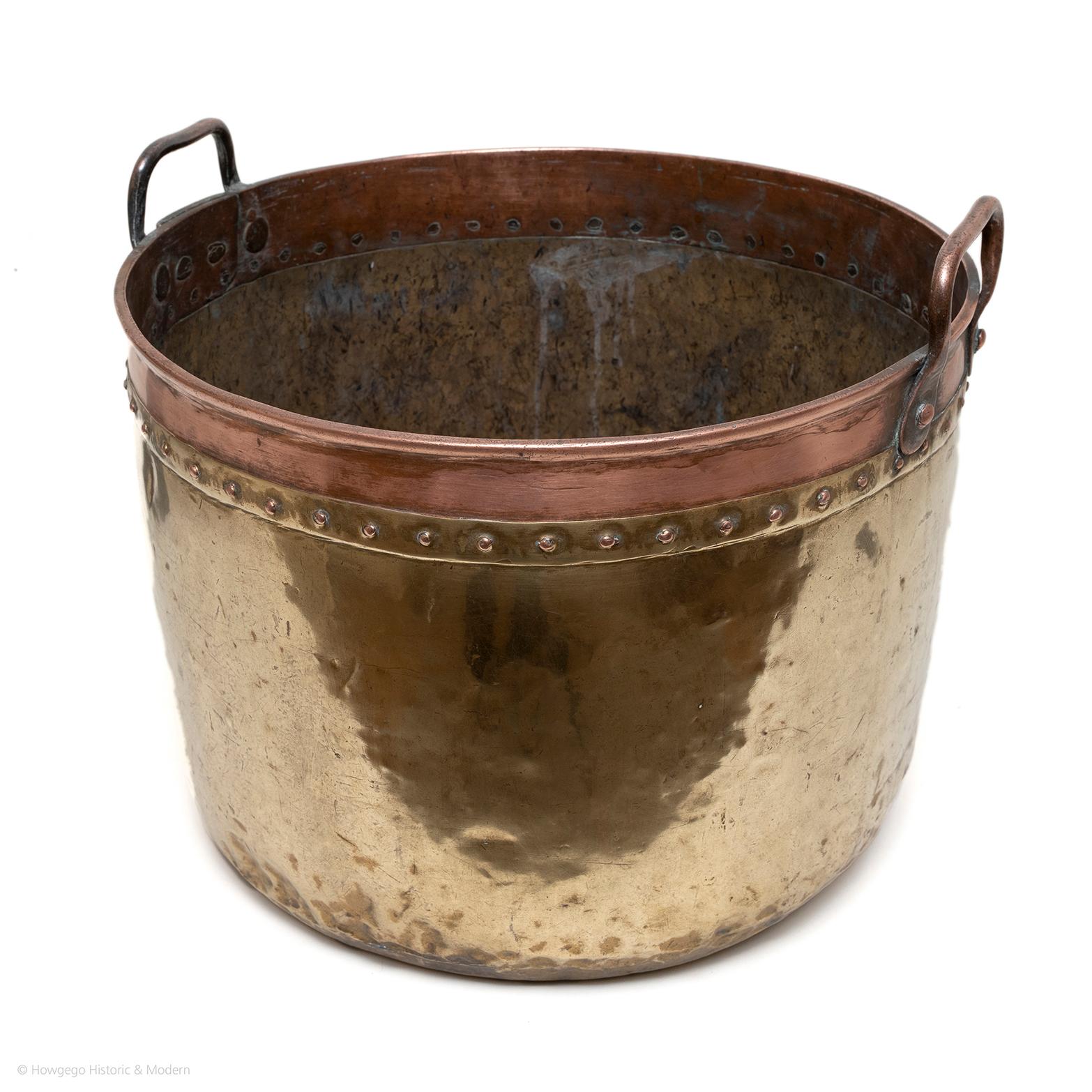 Unusual with the copper band which is highly decorative elevating the calibre of this log bin.
Holds a large quantity of large logs or coal.
Suitable for everyday use.
Could be re-purposed as a jardiniere or wine cooler for a party.

An upper band