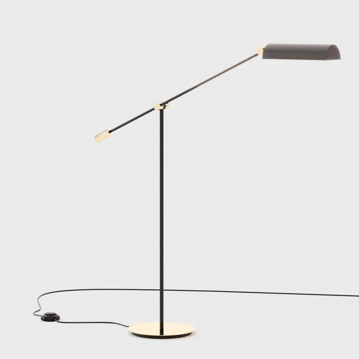 Floor Lamp Loggi in raw iron in
polished iron finish and in polished 
stainless steel in gold finish.