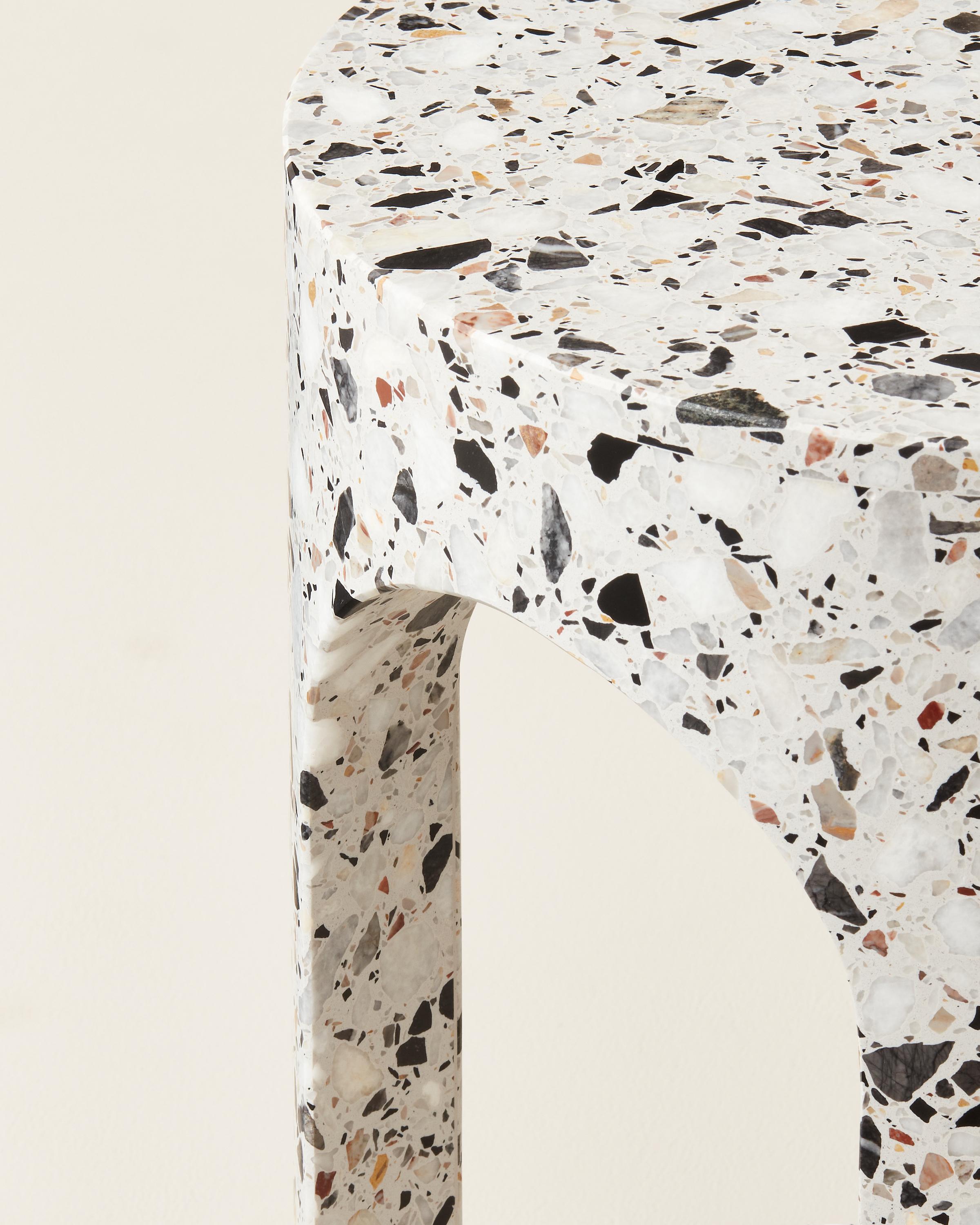 Loggia is a side table made in marble/resin terrazzo.
Made in Italy

A material, traditionally used in the Renaissance for the paving of the noble palaces, here is reinterpreted in the third dimension carved and carefully polished in mat finishing