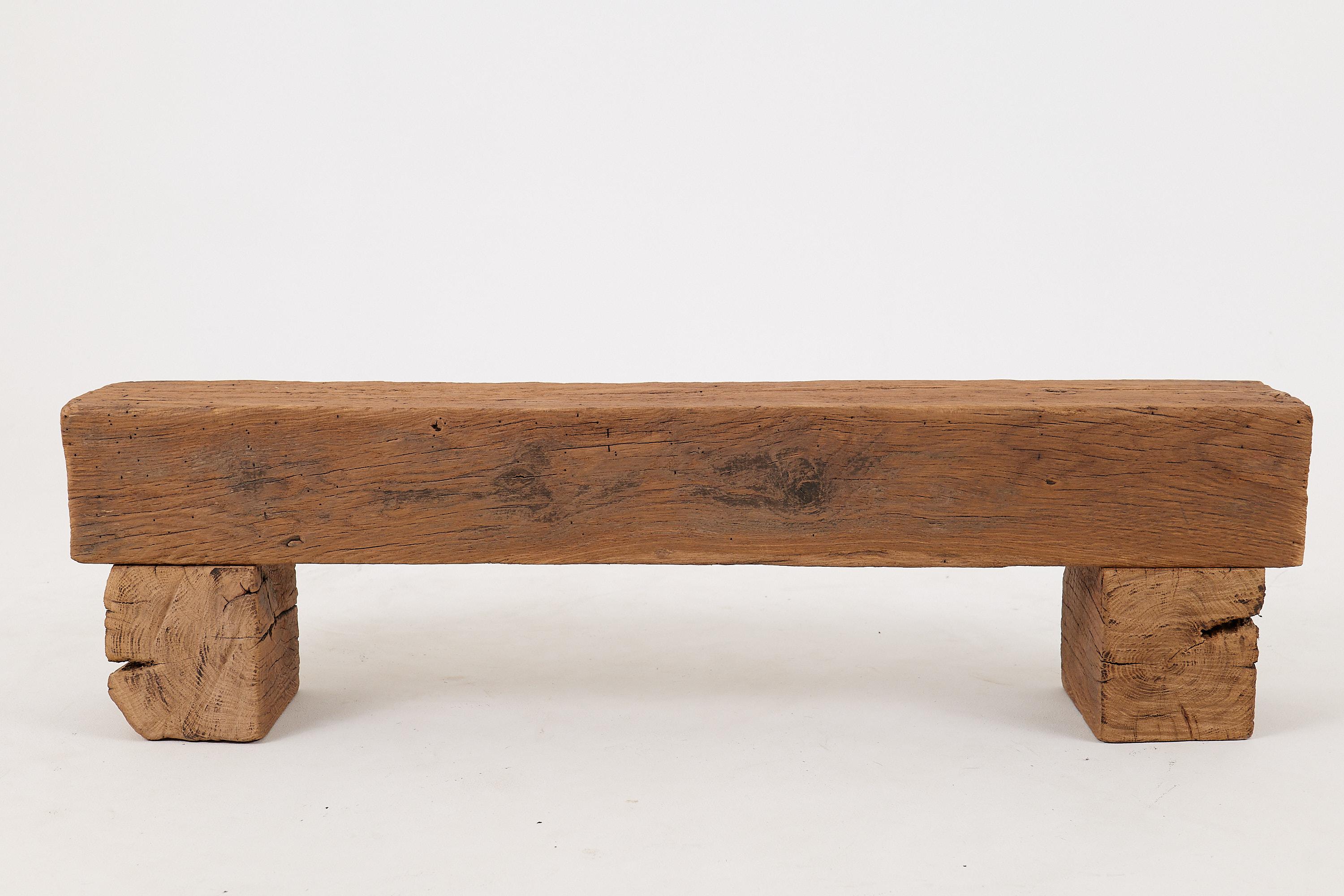 Introducing our exquisite reclaimed oak bench, a testament to timeless craftsmanship and sustainable design. This rustic piece features a beautifully weathered surface that highlights the oak's natural beauty, making it a striking focal point in any