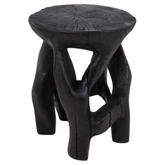Logniture, Skulpturaler Beistelltisch aus Massivholz, geschliffenes schwarzes Holz, Satyrs