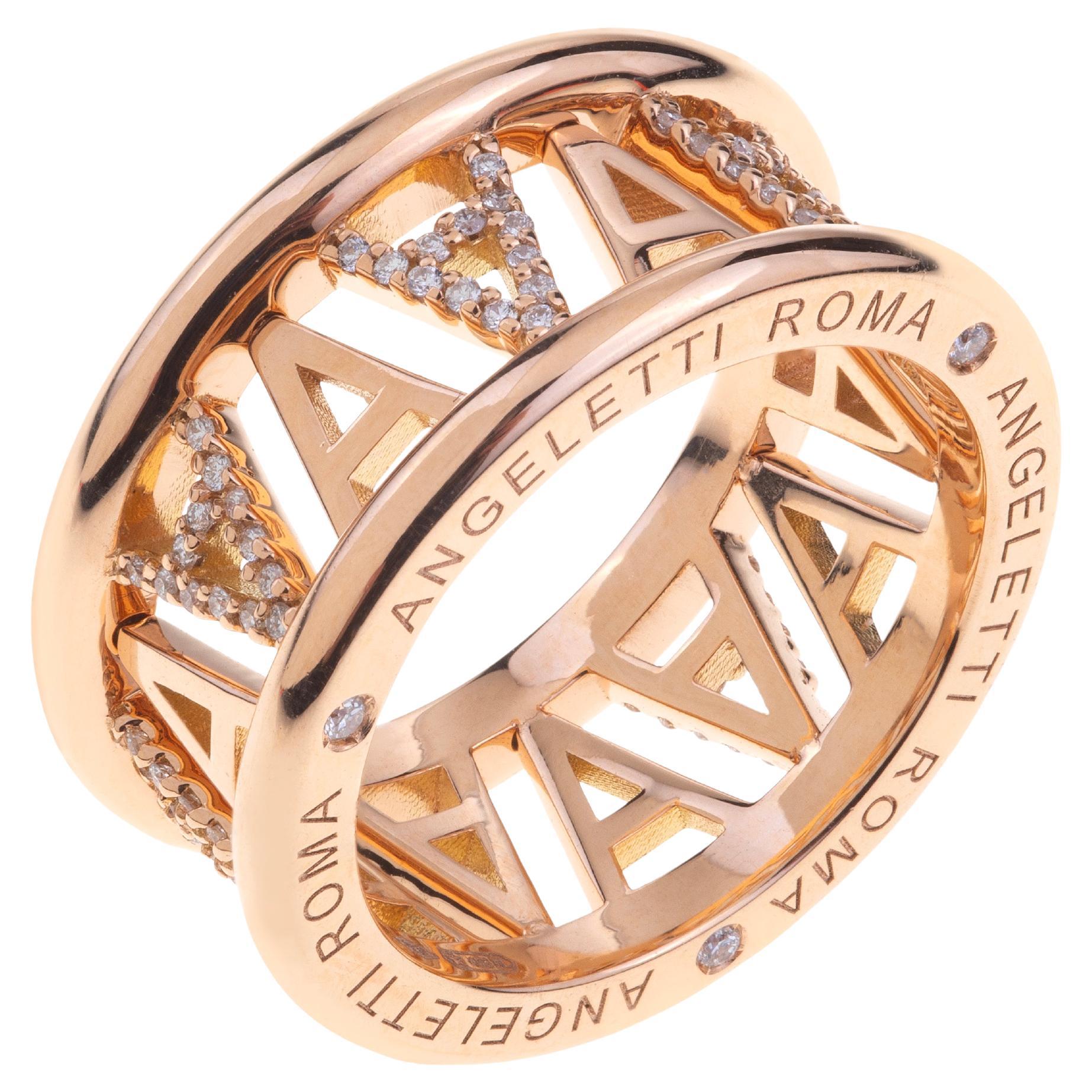 Logo di Angeletti. Anello in oro rosa con "A" alternata e diamanti gialli in vendita