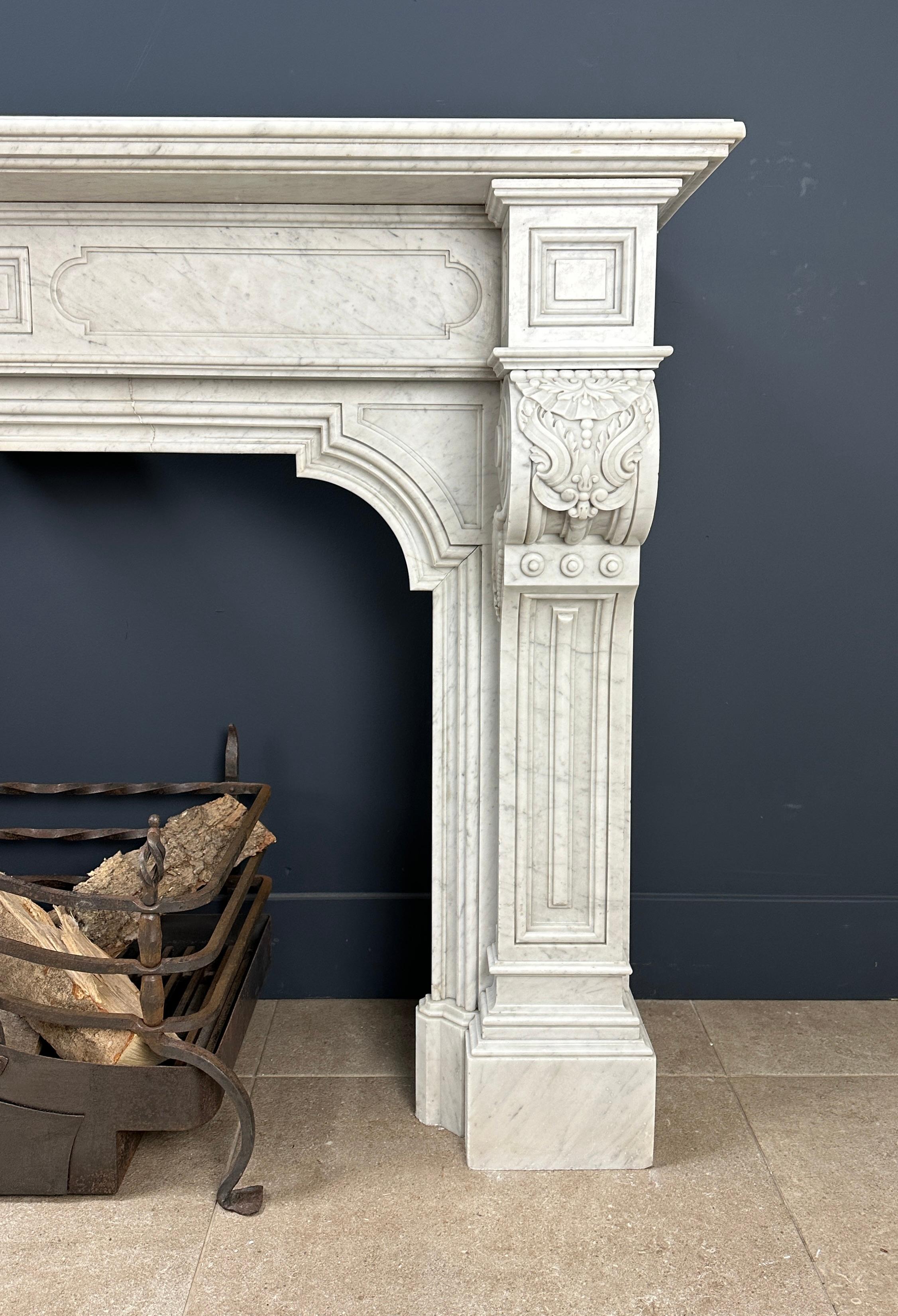 Step into the lush world of antique grandeur with this enchanting fireplace surround in the refined Louis XVI style. Carved from precious Carrara marble, this centerpiece exudes timeless elegance that transforms the space into an oasis of luxury.