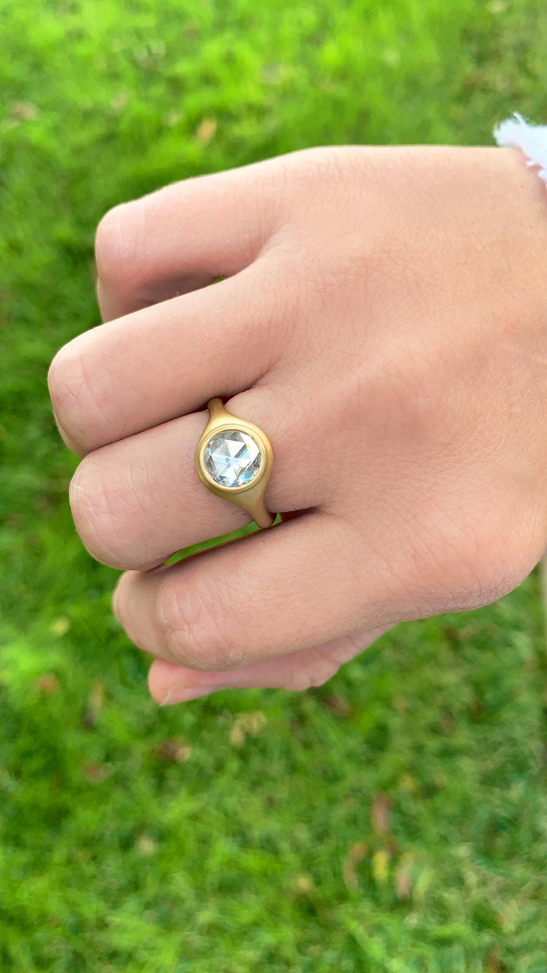 One of a Kind Solitaire Ring hand-fabricated by jewelry maker Lola Brooks featuring a gorgeous, shimmering 1.51 carat rose-cut round white diamond bezel-set and framed in the artist's signature cast and matte-finished 18k yellow gold. Size 6.0.
