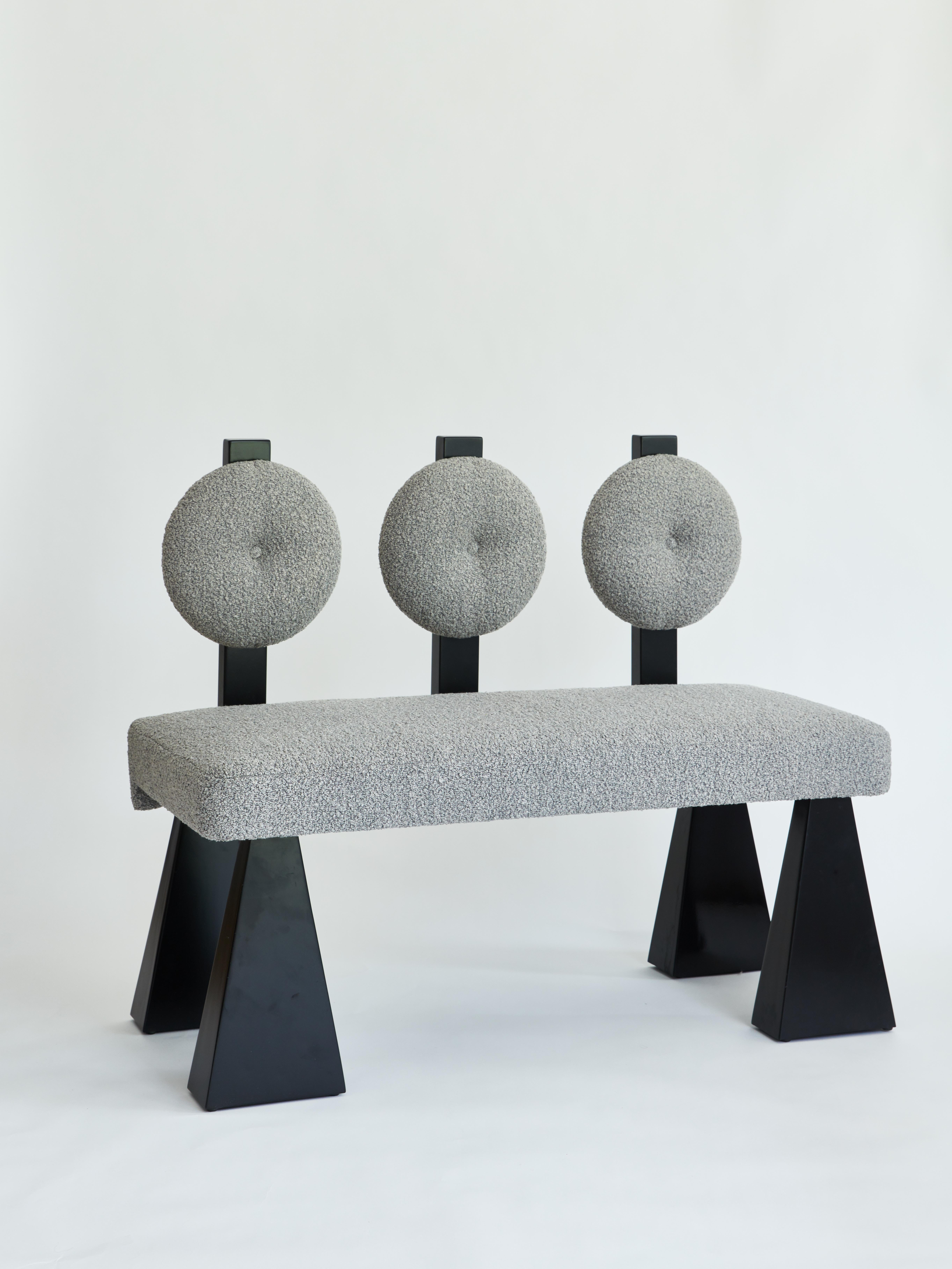 Made to order bouclé and wood settee designed by Christian Siriano.

Fabric for seat/back cushion:
Gray Bouclé

Base: Black lacquered maple

Also available in natural maple and ivory bouclé.