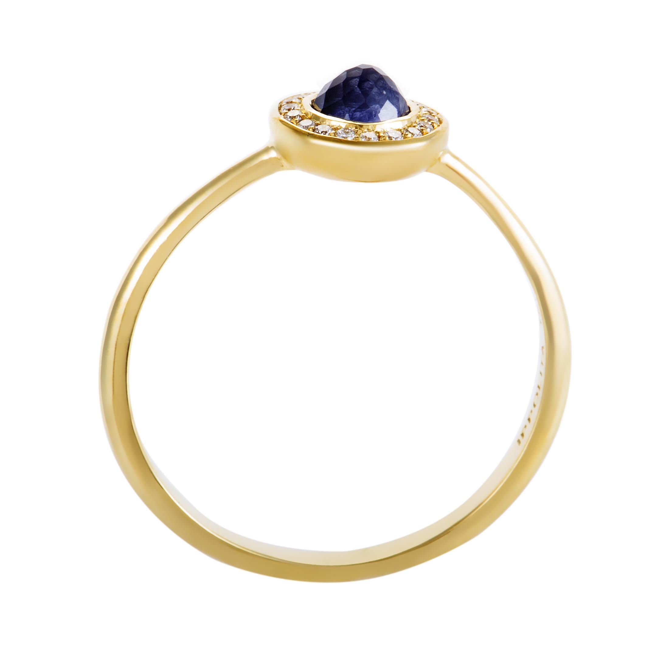 Exquisitely cut, delightfully feminine and elegantly understated, the nifty iolite is encircled by sparkling diamonds amounting to 0.08ct to produce a charming allure in this gorgeous 18K yellow gold ring from Ippolita’s “Lollipop” collection.
Ring