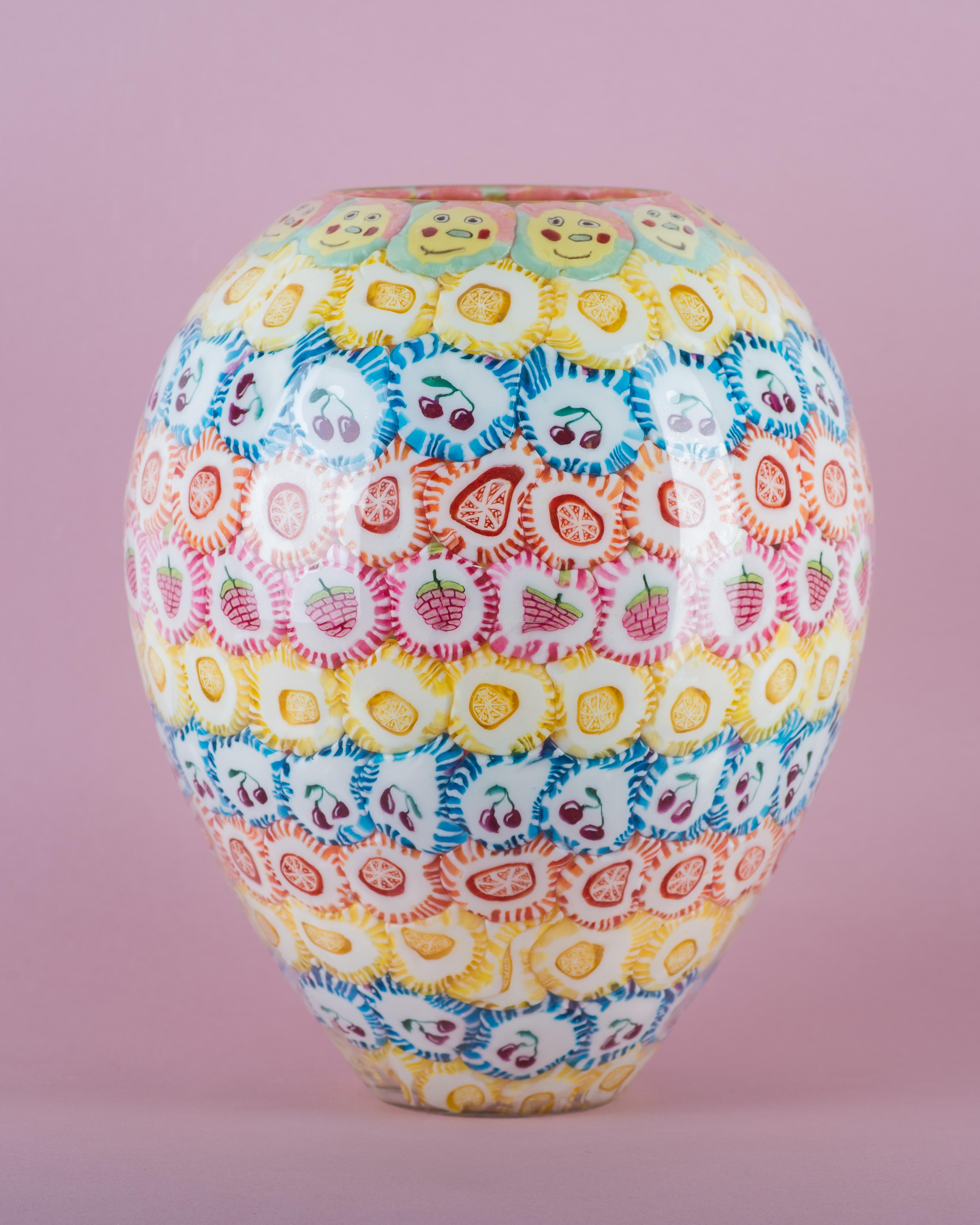Lollipop vases are the most iconic art-pieces by Anna Jozova. It's a humorous reaction to expensive and demanding technique of Murano glass. Lollipops are glued from inside of the handblown crystal shape and later protected by clear material. All of