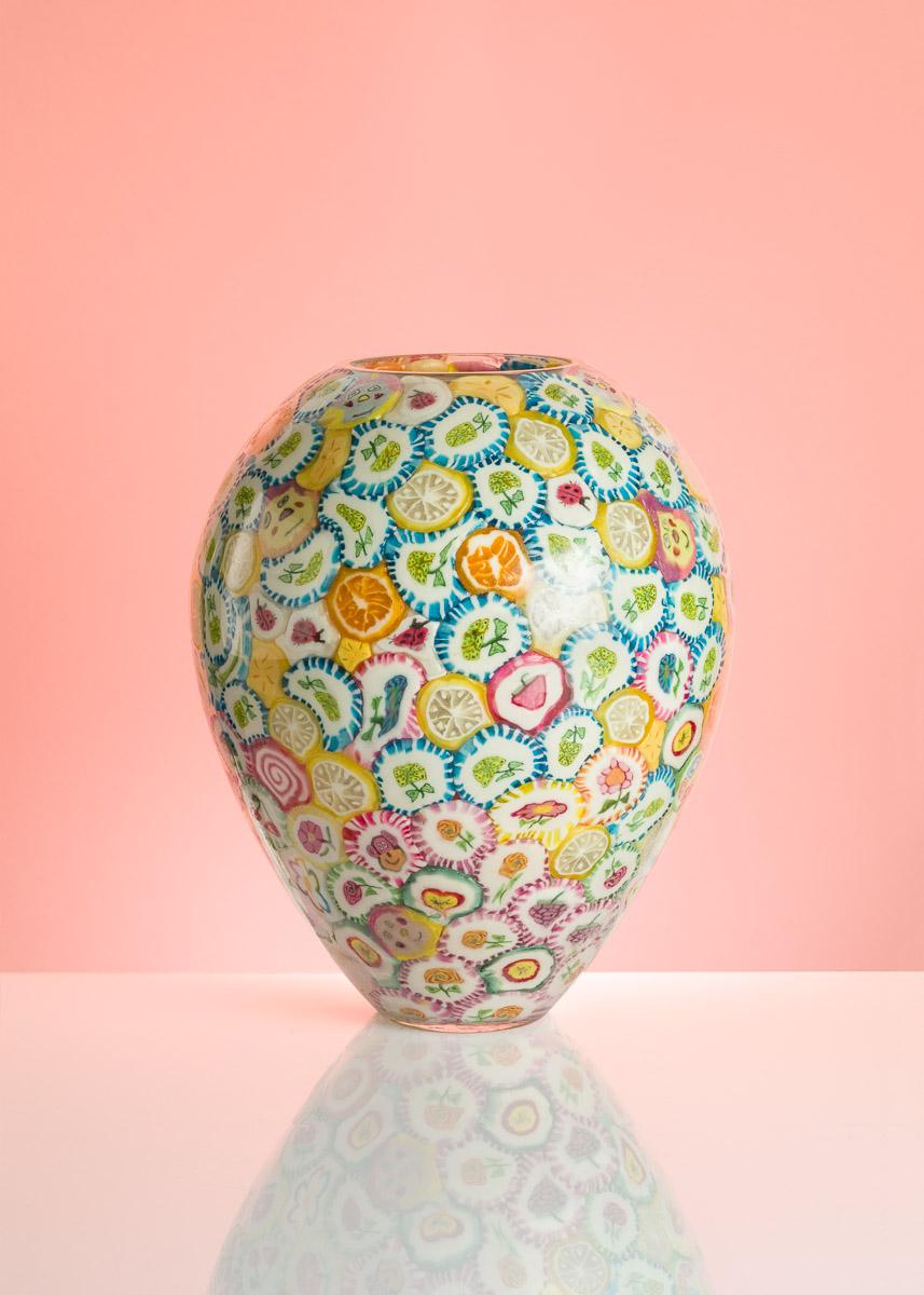 Lollipop vases are the most iconic art-pieces by Anna Jozova. It's a humorous reaction to expensive and demanding technique of Murano glass. Lollipops are glued from inside of the handblown crystal shape and later protected by clear material. All of